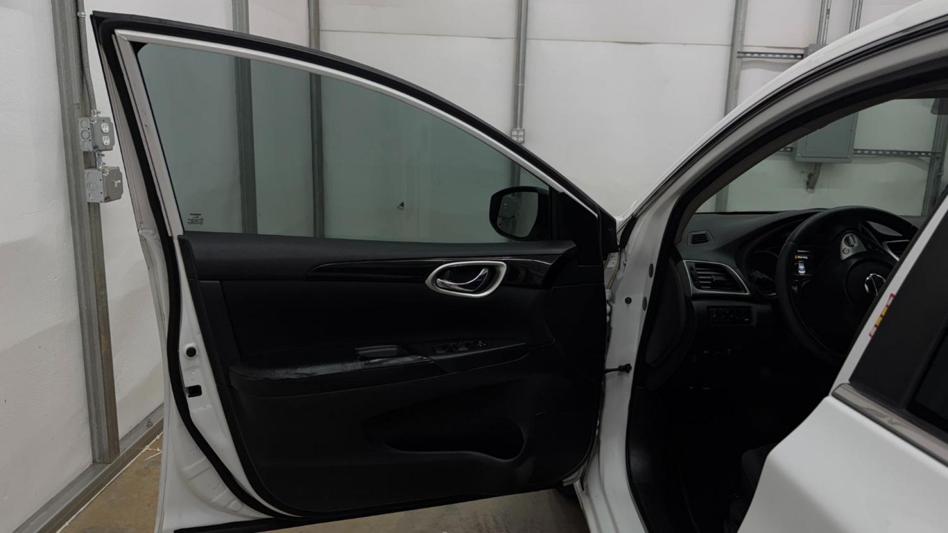 2018 White Nissan Sentra S CVT (3N1AB7AP5JL) with an 1.8L L4 SFI DOHC 16 engine, Continuously Variabl transmission, located at 1806 Veterans Memorial Hwy SW, Austell, GA, 30168, (770) 944-9558, 33.817959, -84.606987 - Photo#11
