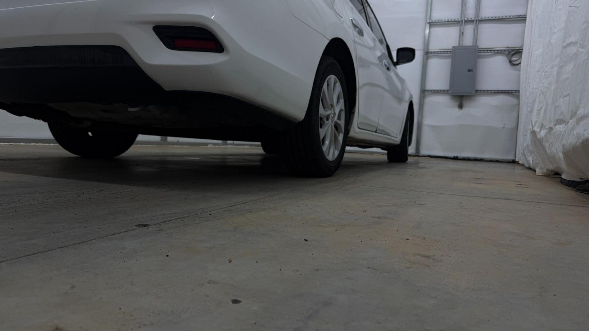 2018 White Nissan Sentra S CVT (3N1AB7AP5JL) with an 1.8L L4 SFI DOHC 16 engine, Continuously Variabl transmission, located at 1806 Veterans Memorial Hwy SW, Austell, GA, 30168, (770) 944-9558, 33.817959, -84.606987 - Photo#21