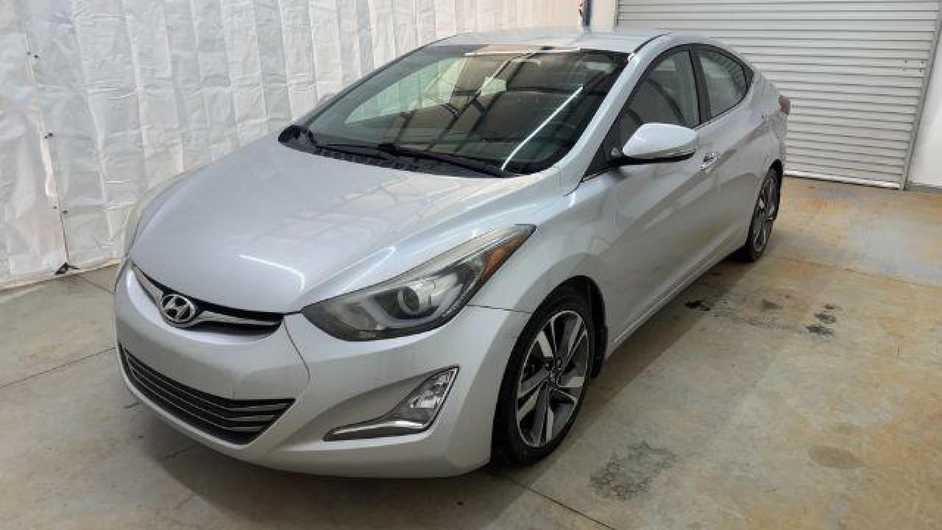 2016 Silver Hyundai Elantra Limited (KMHDH4AE7GU) with an 1.8L L4 DOHC 16V engine, 6-Speed Automatic transmission, located at 1806 Veterans Memorial Hwy SW, Austell, GA, 30168, (770) 944-9558, 33.817959, -84.606987 - Photo#0
