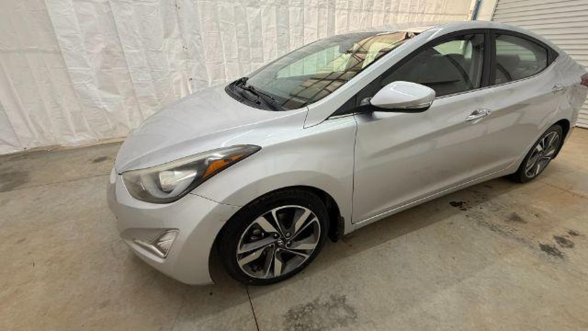 2016 Silver Hyundai Elantra Limited (KMHDH4AE7GU) with an 1.8L L4 DOHC 16V engine, 6-Speed Automatic transmission, located at 1806 Veterans Memorial Hwy SW, Austell, GA, 30168, (770) 944-9558, 33.817959, -84.606987 - Photo#1