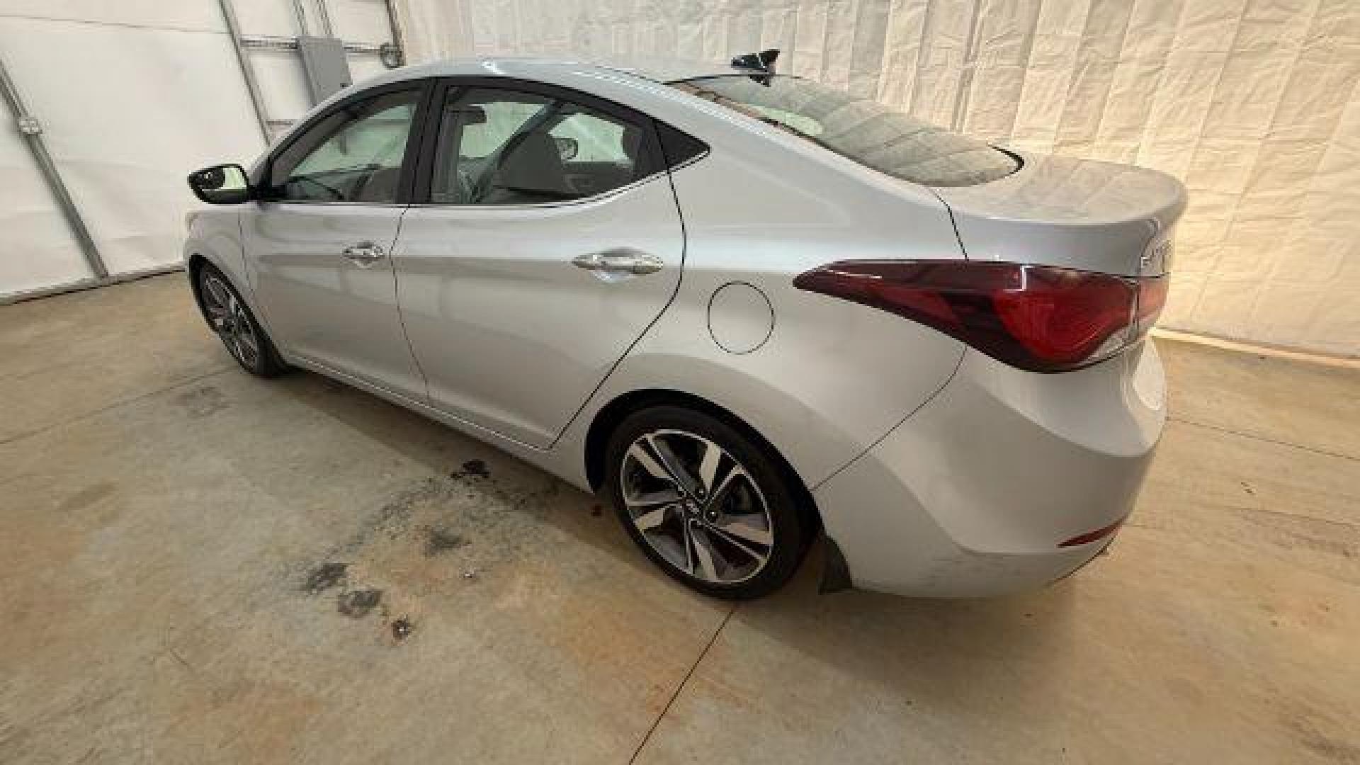 2016 Silver Hyundai Elantra Limited (KMHDH4AE7GU) with an 1.8L L4 DOHC 16V engine, 6-Speed Automatic transmission, located at 1806 Veterans Memorial Hwy SW, Austell, GA, 30168, (770) 944-9558, 33.817959, -84.606987 - Photo#2