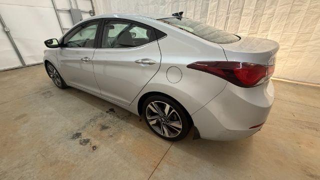 2016 Silver Hyundai Elantra Limited (KMHDH4AE7GU) with an 1.8L L4 DOHC 16V engine, 6-Speed Automatic transmission, located at 1806 Veterans Memorial Hwy SW, Austell, GA, 30168, (770) 944-9558, 33.817959, -84.606987 - Photo#2