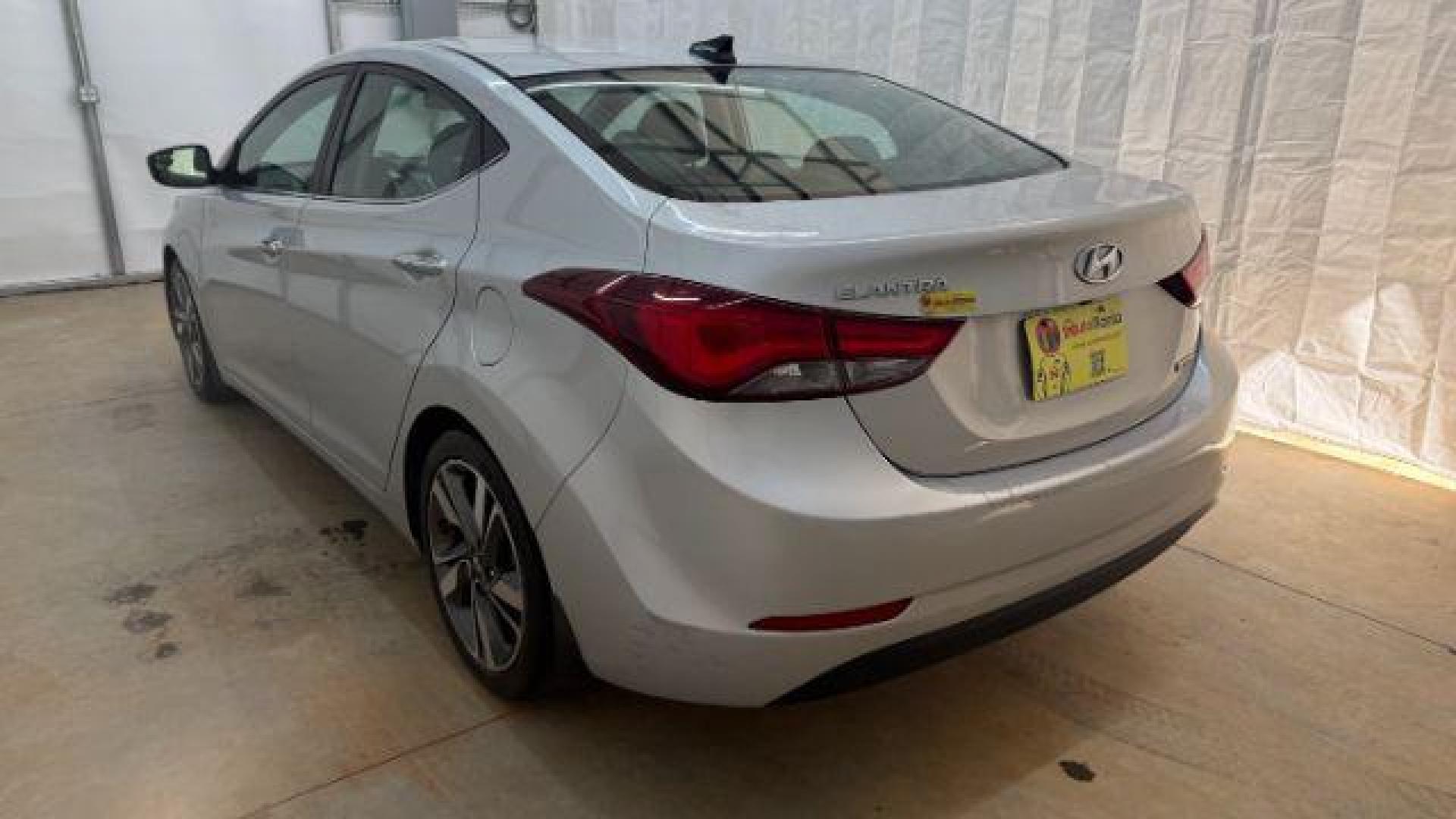 2016 Silver Hyundai Elantra Limited (KMHDH4AE7GU) with an 1.8L L4 DOHC 16V engine, 6-Speed Automatic transmission, located at 1806 Veterans Memorial Hwy SW, Austell, GA, 30168, (770) 944-9558, 33.817959, -84.606987 - Photo#3