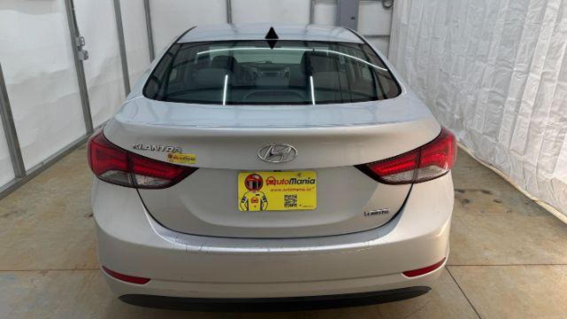 2016 Silver Hyundai Elantra Limited (KMHDH4AE7GU) with an 1.8L L4 DOHC 16V engine, 6-Speed Automatic transmission, located at 1806 Veterans Memorial Hwy SW, Austell, GA, 30168, (770) 944-9558, 33.817959, -84.606987 - Photo#4