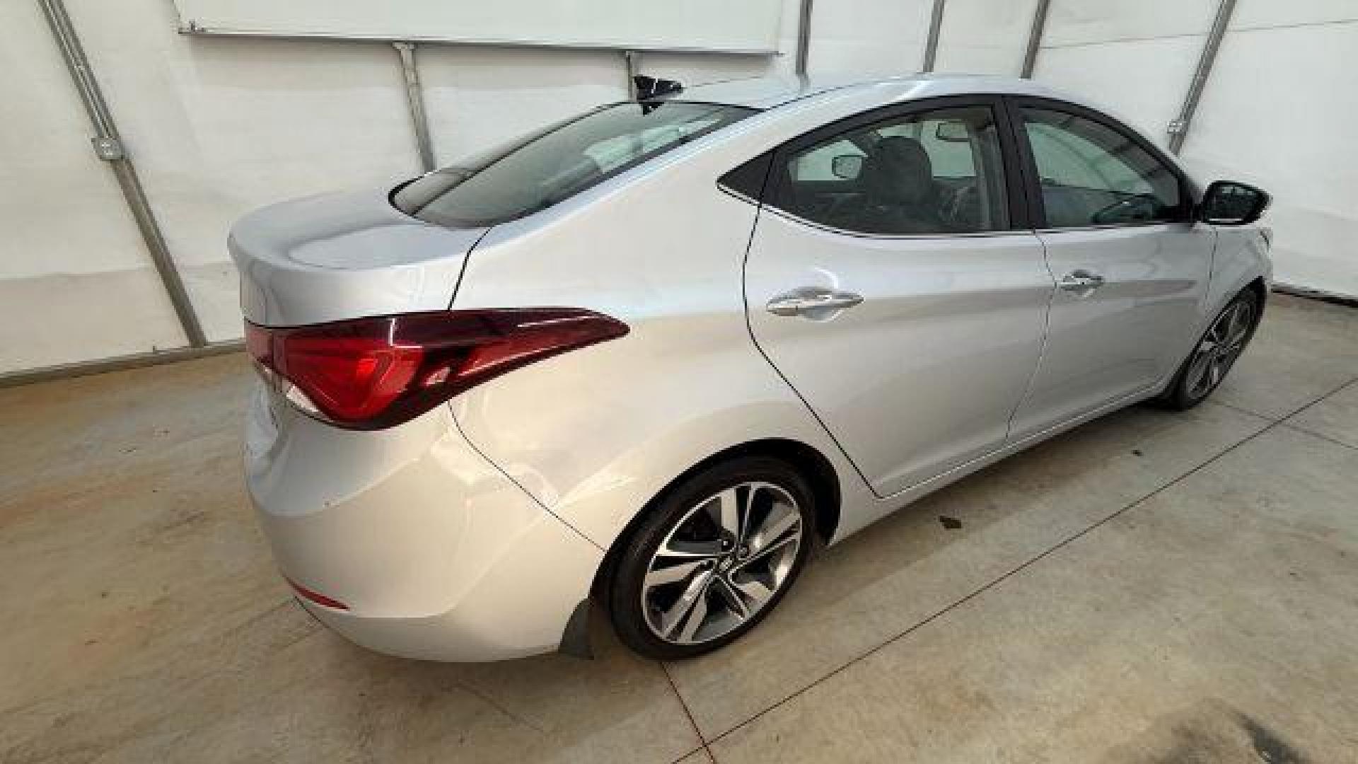 2016 Silver Hyundai Elantra Limited (KMHDH4AE7GU) with an 1.8L L4 DOHC 16V engine, 6-Speed Automatic transmission, located at 1806 Veterans Memorial Hwy SW, Austell, GA, 30168, (770) 944-9558, 33.817959, -84.606987 - Photo#6