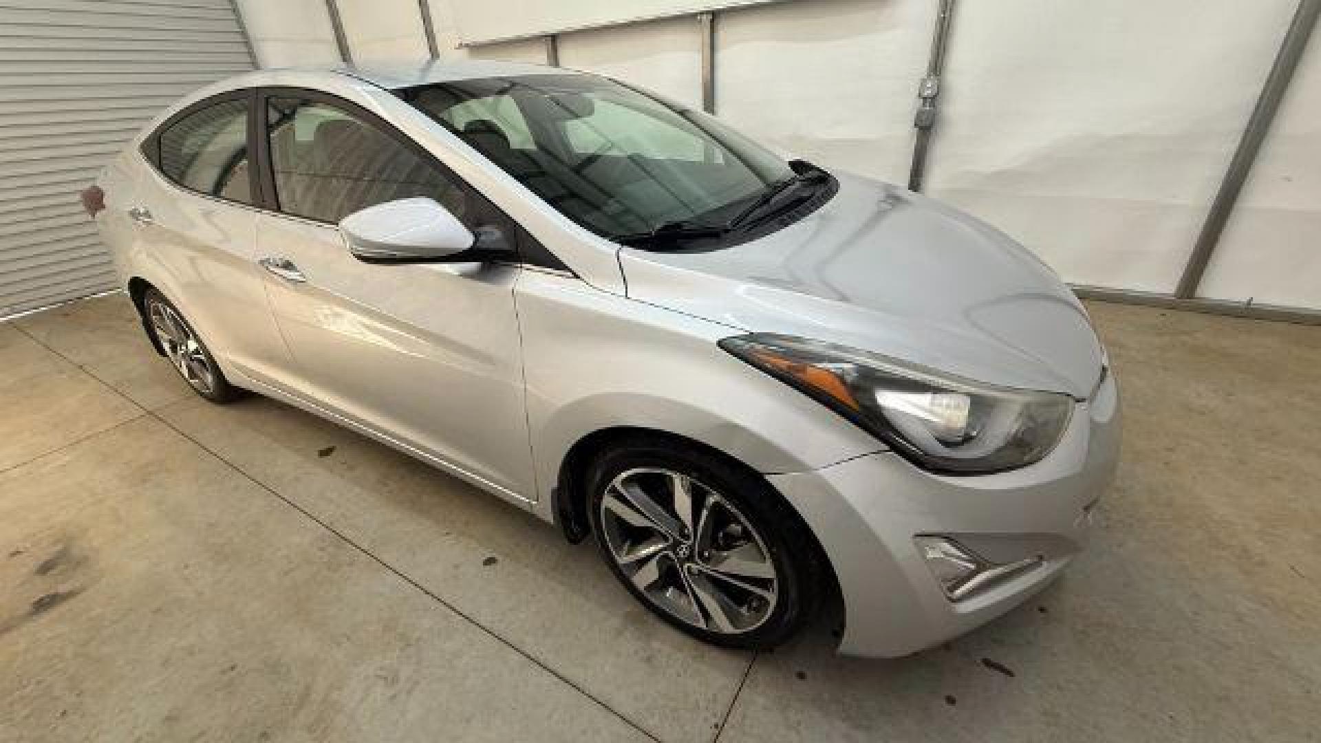 2016 Silver Hyundai Elantra Limited (KMHDH4AE7GU) with an 1.8L L4 DOHC 16V engine, 6-Speed Automatic transmission, located at 1806 Veterans Memorial Hwy SW, Austell, GA, 30168, (770) 944-9558, 33.817959, -84.606987 - Photo#7