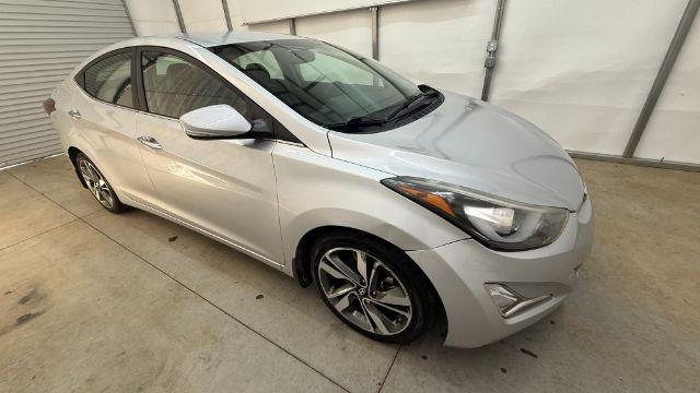 2016 Silver Hyundai Elantra Limited (KMHDH4AE7GU) with an 1.8L L4 DOHC 16V engine, 6-Speed Automatic transmission, located at 1806 Veterans Memorial Hwy SW, Austell, GA, 30168, (770) 944-9558, 33.817959, -84.606987 - Photo#7