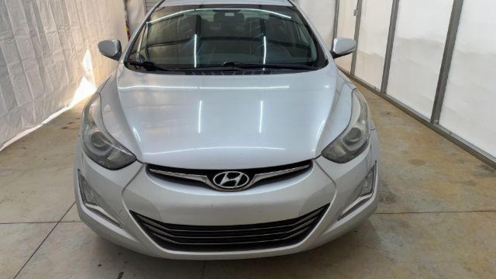 2016 Silver Hyundai Elantra Limited (KMHDH4AE7GU) with an 1.8L L4 DOHC 16V engine, 6-Speed Automatic transmission, located at 1806 Veterans Memorial Hwy SW, Austell, GA, 30168, (770) 944-9558, 33.817959, -84.606987 - Photo#9