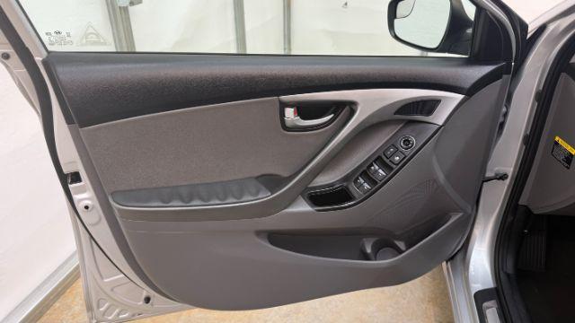 2016 Silver Hyundai Elantra Limited (KMHDH4AE7GU) with an 1.8L L4 DOHC 16V engine, 6-Speed Automatic transmission, located at 1806 Veterans Memorial Hwy SW, Austell, GA, 30168, (770) 944-9558, 33.817959, -84.606987 - Photo#10