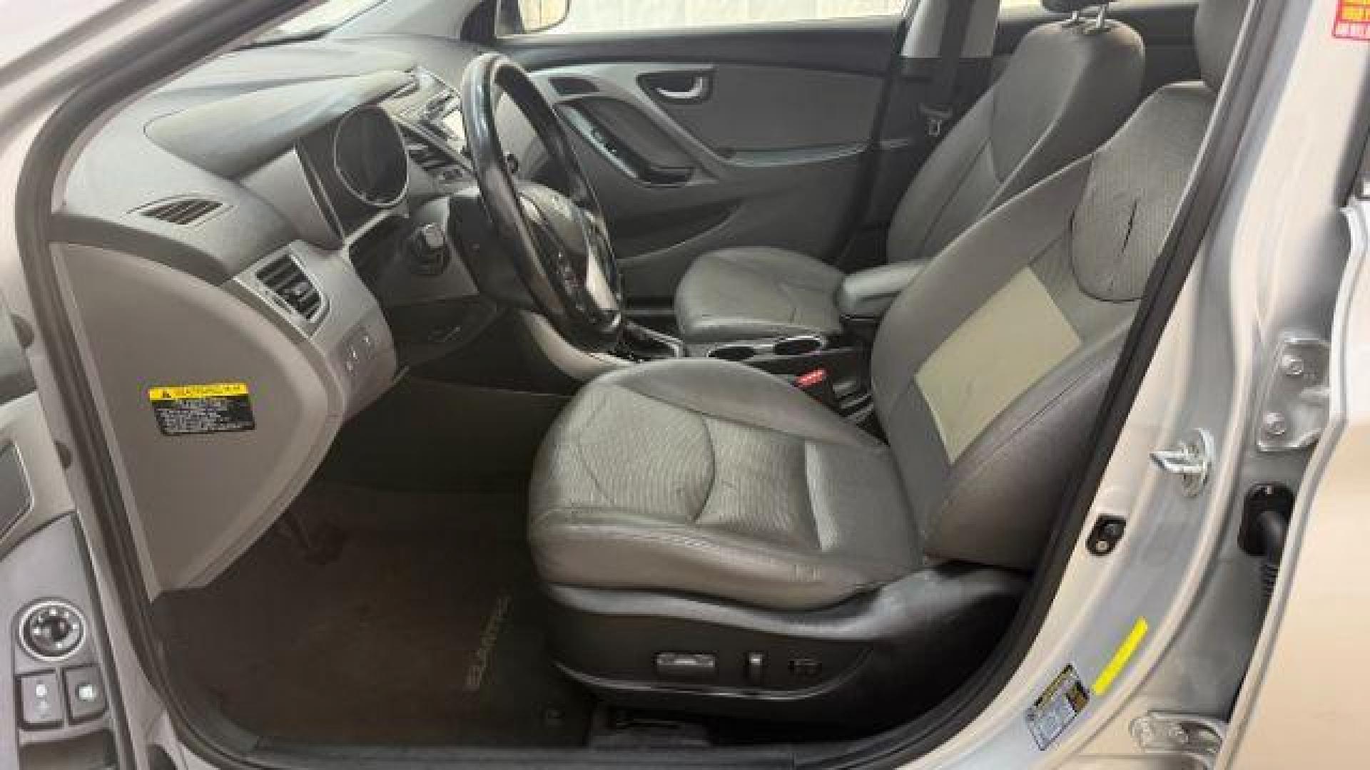 2016 Silver Hyundai Elantra Limited (KMHDH4AE7GU) with an 1.8L L4 DOHC 16V engine, 6-Speed Automatic transmission, located at 1806 Veterans Memorial Hwy SW, Austell, GA, 30168, (770) 944-9558, 33.817959, -84.606987 - Photo#11