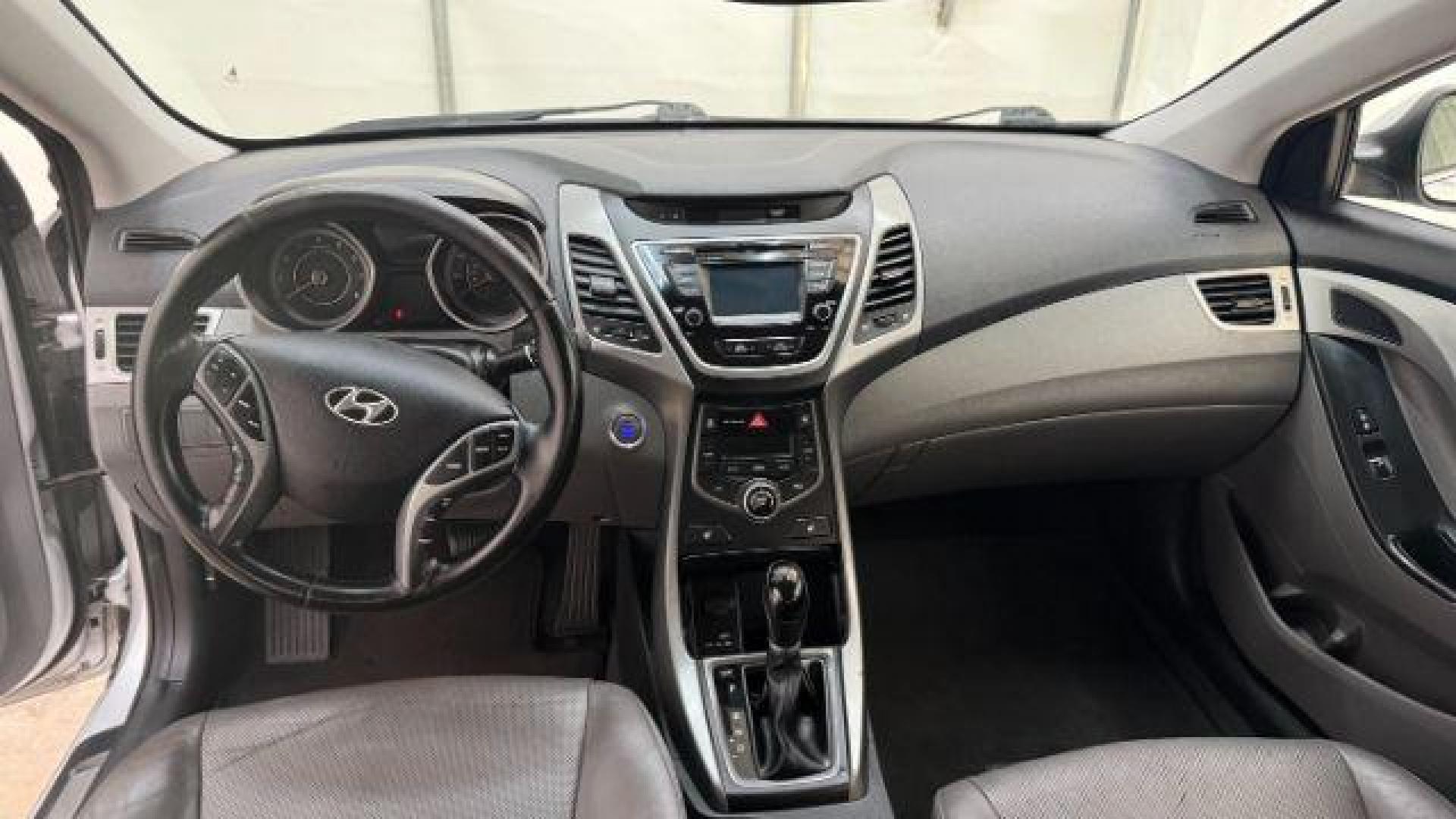 2016 Silver Hyundai Elantra Limited (KMHDH4AE7GU) with an 1.8L L4 DOHC 16V engine, 6-Speed Automatic transmission, located at 1806 Veterans Memorial Hwy SW, Austell, GA, 30168, (770) 944-9558, 33.817959, -84.606987 - Photo#13