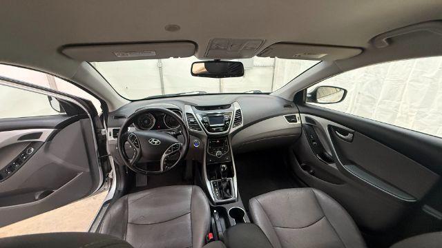 2016 Silver Hyundai Elantra Limited (KMHDH4AE7GU) with an 1.8L L4 DOHC 16V engine, 6-Speed Automatic transmission, located at 1806 Veterans Memorial Hwy SW, Austell, GA, 30168, (770) 944-9558, 33.817959, -84.606987 - Photo#14