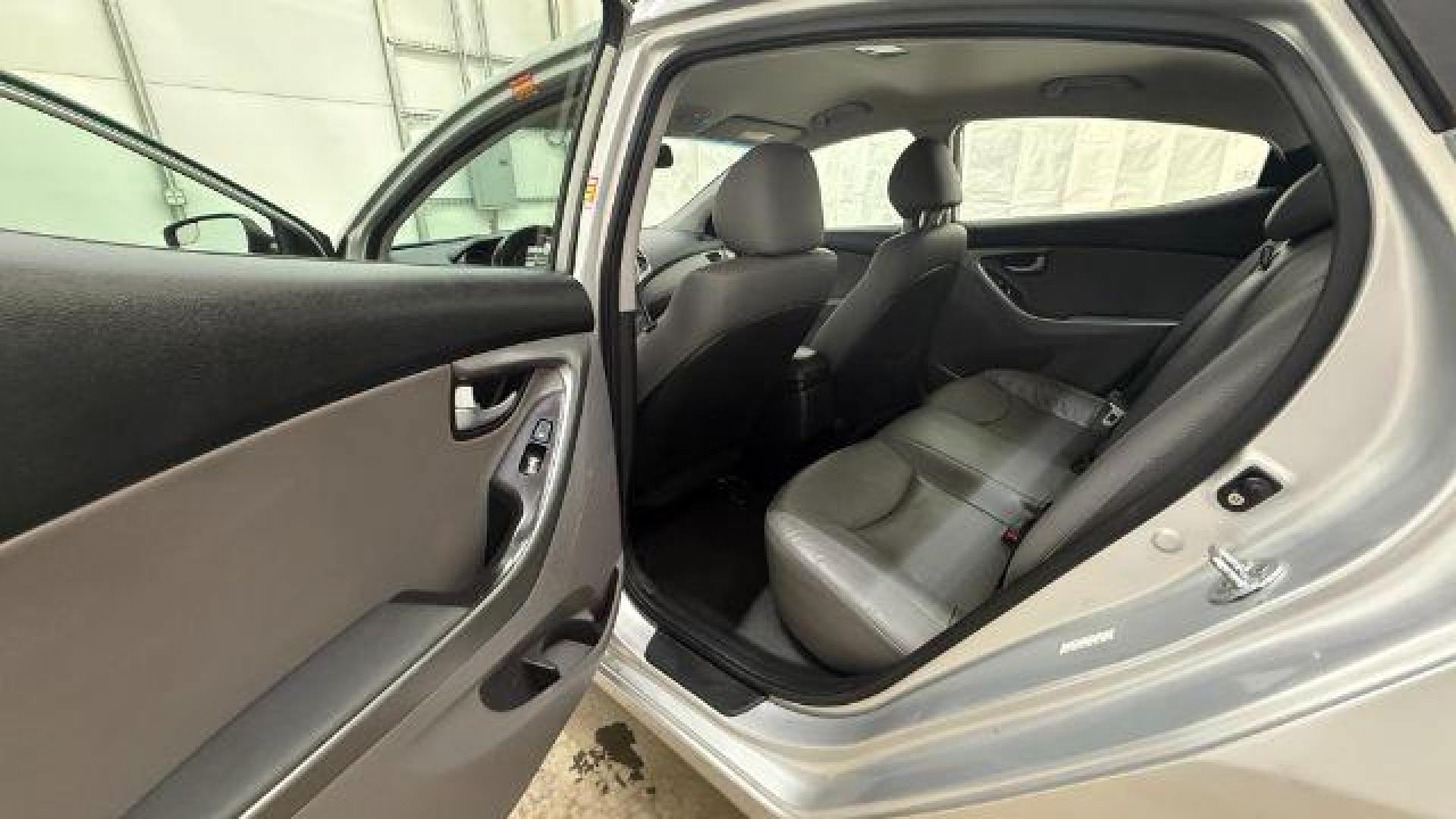 2016 Silver Hyundai Elantra Limited (KMHDH4AE7GU) with an 1.8L L4 DOHC 16V engine, 6-Speed Automatic transmission, located at 1806 Veterans Memorial Hwy SW, Austell, GA, 30168, (770) 944-9558, 33.817959, -84.606987 - Photo#15