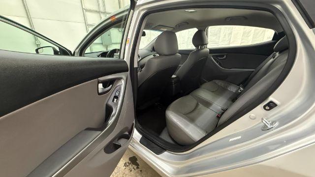 2016 Silver Hyundai Elantra Limited (KMHDH4AE7GU) with an 1.8L L4 DOHC 16V engine, 6-Speed Automatic transmission, located at 1806 Veterans Memorial Hwy SW, Austell, GA, 30168, (770) 944-9558, 33.817959, -84.606987 - Photo#15