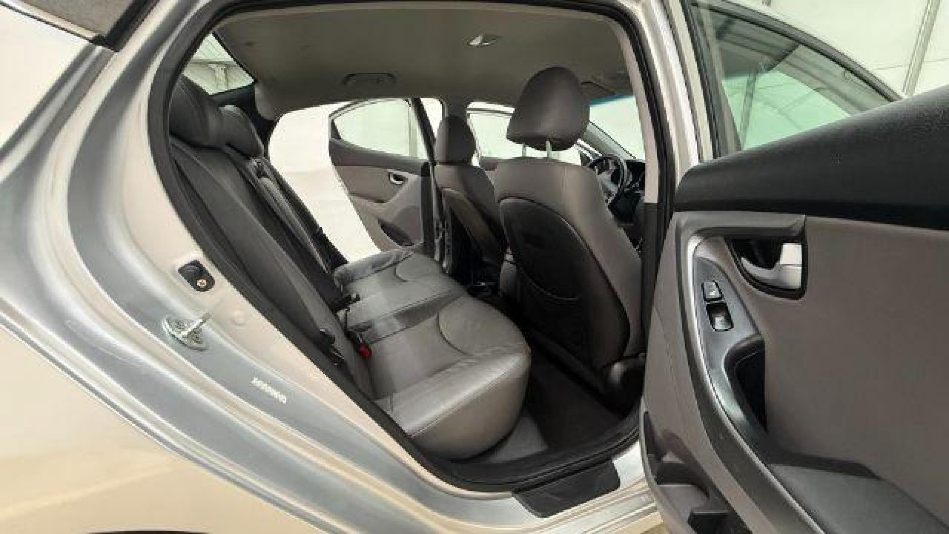 2016 Silver Hyundai Elantra Limited (KMHDH4AE7GU) with an 1.8L L4 DOHC 16V engine, 6-Speed Automatic transmission, located at 1806 Veterans Memorial Hwy SW, Austell, GA, 30168, (770) 944-9558, 33.817959, -84.606987 - Photo#16