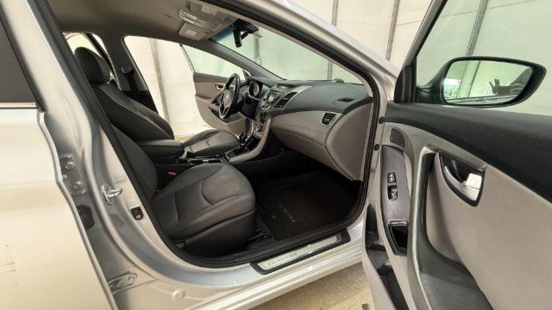 2016 Silver Hyundai Elantra Limited (KMHDH4AE7GU) with an 1.8L L4 DOHC 16V engine, 6-Speed Automatic transmission, located at 1806 Veterans Memorial Hwy SW, Austell, GA, 30168, (770) 944-9558, 33.817959, -84.606987 - Photo#17