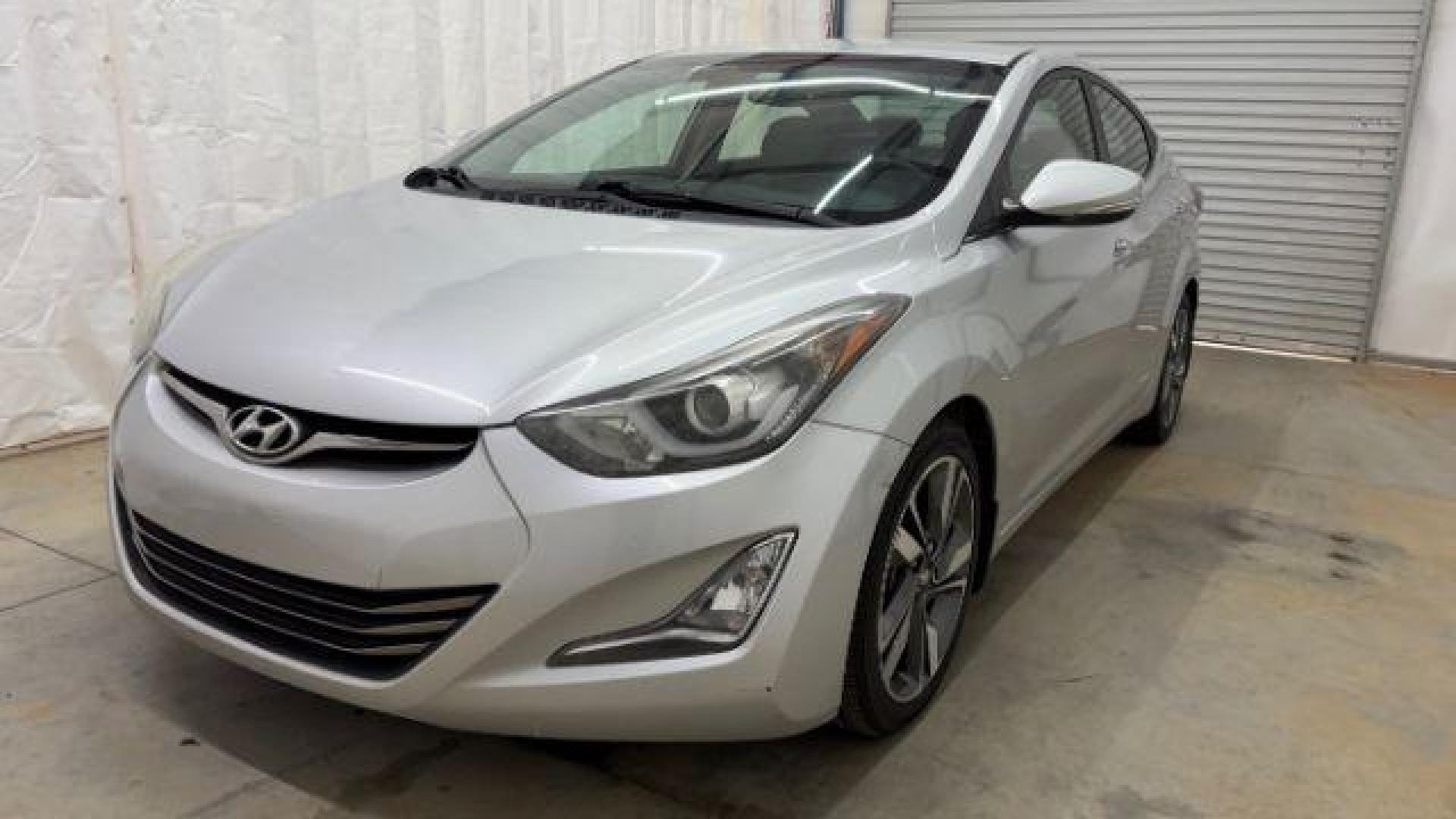 2016 Silver Hyundai Elantra Limited (KMHDH4AE7GU) with an 1.8L L4 DOHC 16V engine, 6-Speed Automatic transmission, located at 1806 Veterans Memorial Hwy SW, Austell, GA, 30168, (770) 944-9558, 33.817959, -84.606987 - Photo#0