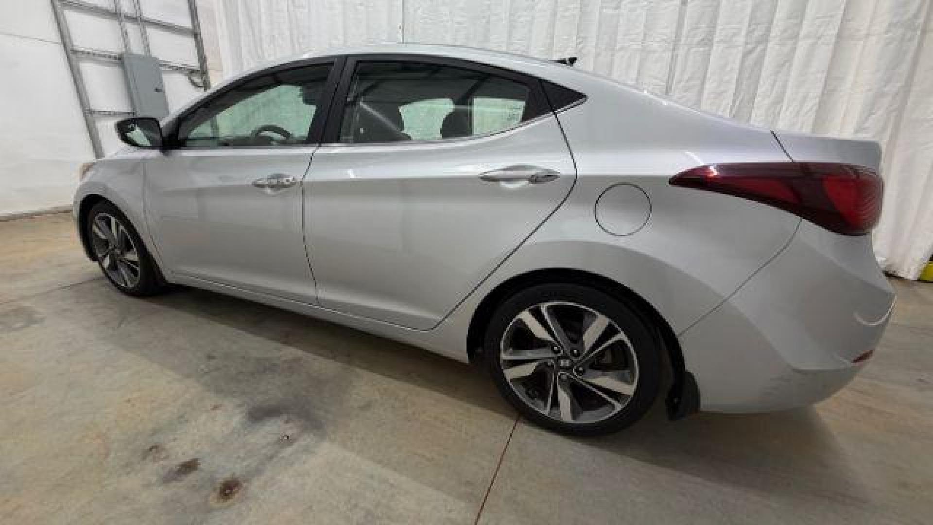 2016 Silver Hyundai Elantra Limited (KMHDH4AE7GU) with an 1.8L L4 DOHC 16V engine, 6-Speed Automatic transmission, located at 1806 Veterans Memorial Hwy SW, Austell, GA, 30168, (770) 944-9558, 33.817959, -84.606987 - Photo#2