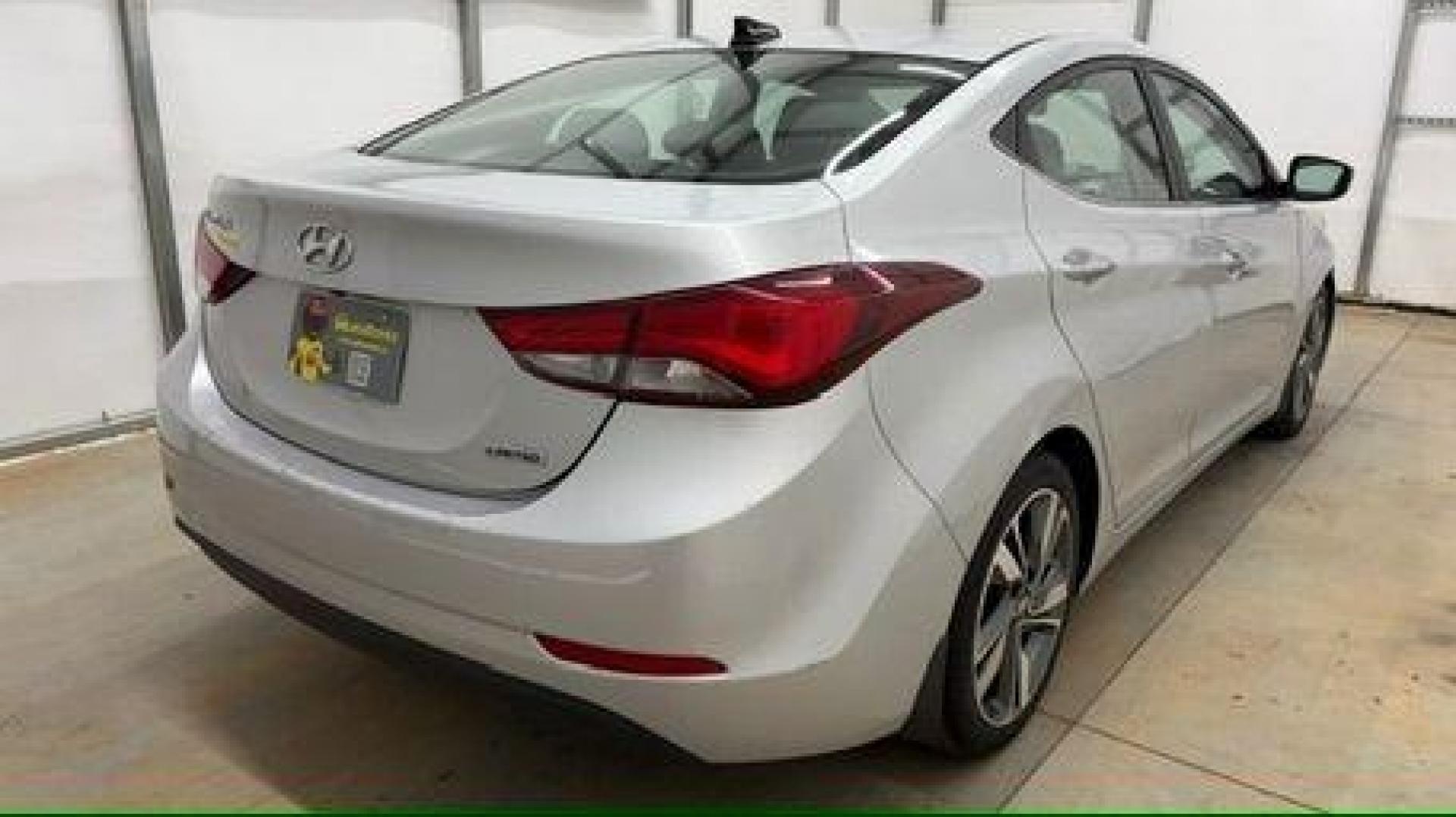 2016 Silver Hyundai Elantra Limited (KMHDH4AE7GU) with an 1.8L L4 DOHC 16V engine, 6-Speed Automatic transmission, located at 1806 Veterans Memorial Hwy SW, Austell, GA, 30168, (770) 944-9558, 33.817959, -84.606987 - Photo#5