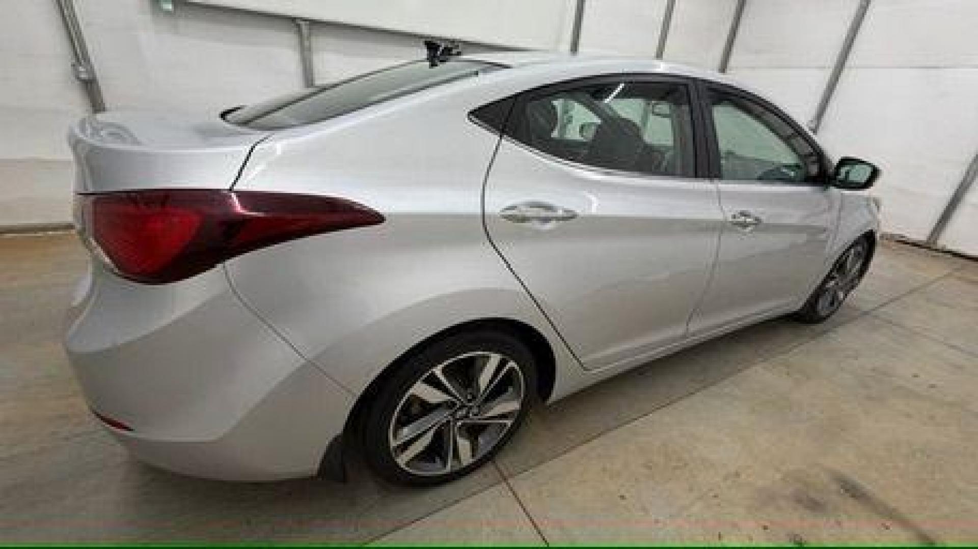 2016 Silver Hyundai Elantra Limited (KMHDH4AE7GU) with an 1.8L L4 DOHC 16V engine, 6-Speed Automatic transmission, located at 1806 Veterans Memorial Hwy SW, Austell, GA, 30168, (770) 944-9558, 33.817959, -84.606987 - Photo#6