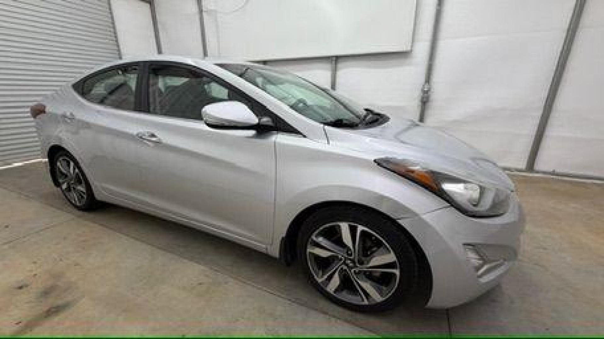 2016 Silver Hyundai Elantra Limited (KMHDH4AE7GU) with an 1.8L L4 DOHC 16V engine, 6-Speed Automatic transmission, located at 1806 Veterans Memorial Hwy SW, Austell, GA, 30168, (770) 944-9558, 33.817959, -84.606987 - Photo#7