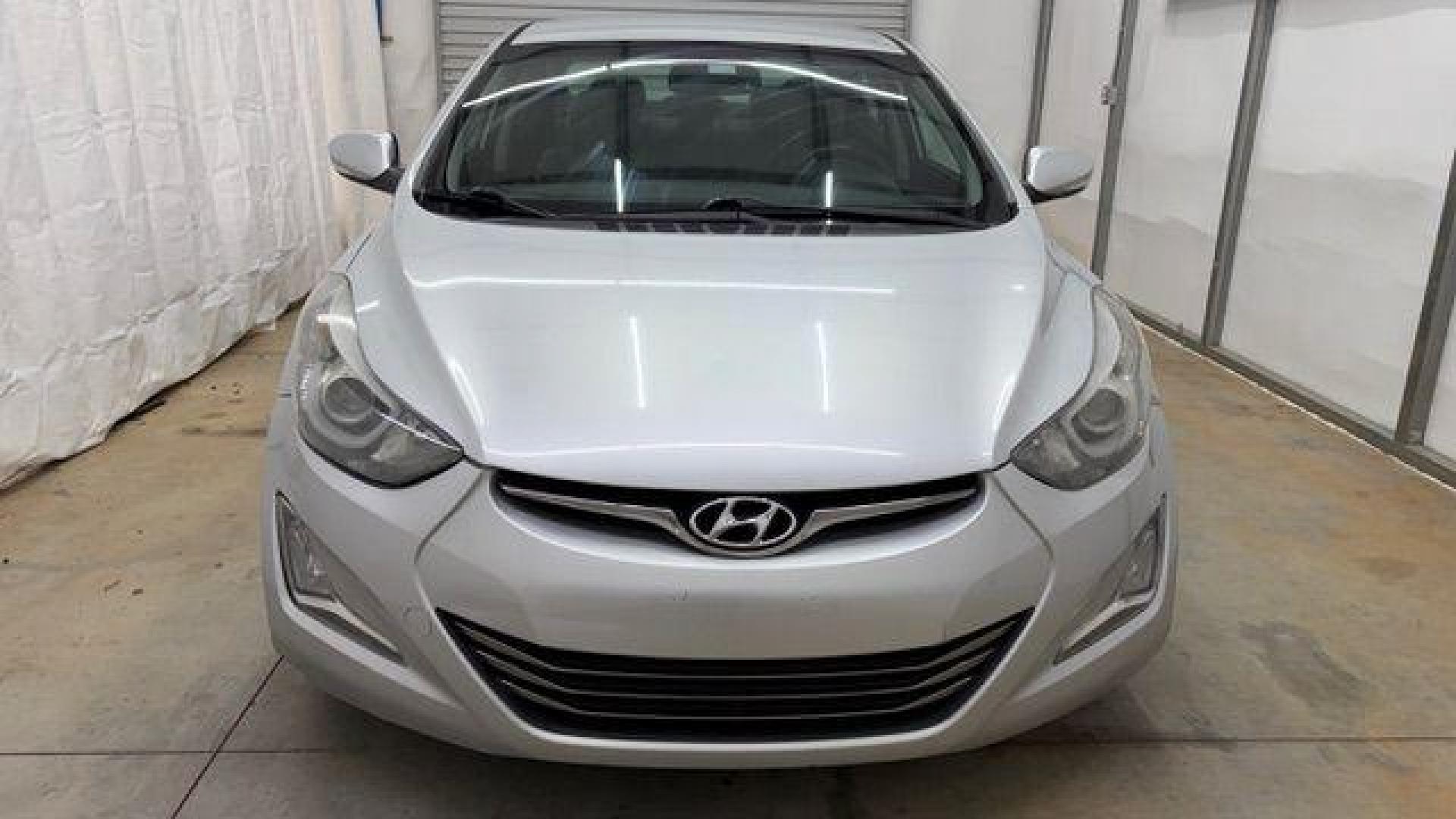 2016 Silver Hyundai Elantra Limited (KMHDH4AE7GU) with an 1.8L L4 DOHC 16V engine, 6-Speed Automatic transmission, located at 1806 Veterans Memorial Hwy SW, Austell, GA, 30168, (770) 944-9558, 33.817959, -84.606987 - Photo#9