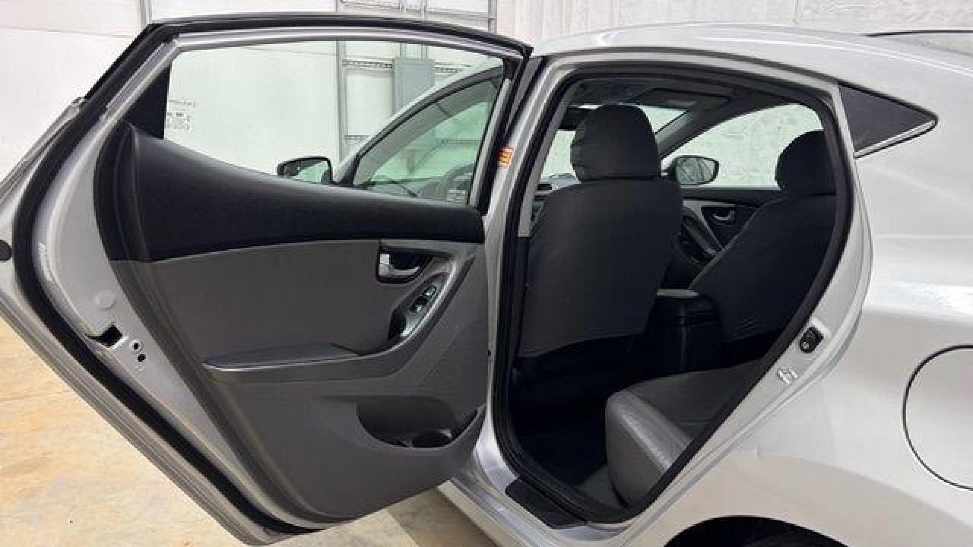 2016 Silver Hyundai Elantra Limited (KMHDH4AE7GU) with an 1.8L L4 DOHC 16V engine, 6-Speed Automatic transmission, located at 1806 Veterans Memorial Hwy SW, Austell, GA, 30168, (770) 944-9558, 33.817959, -84.606987 - Photo#13