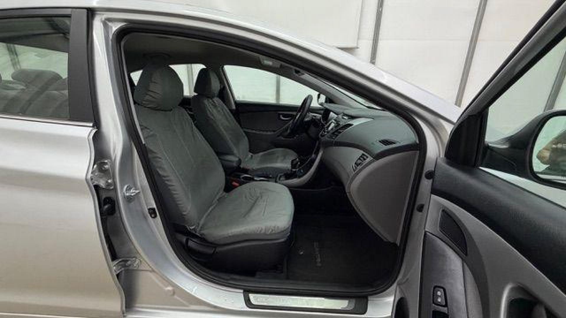 2016 Silver Hyundai Elantra Limited (KMHDH4AE7GU) with an 1.8L L4 DOHC 16V engine, 6-Speed Automatic transmission, located at 1806 Veterans Memorial Hwy SW, Austell, GA, 30168, (770) 944-9558, 33.817959, -84.606987 - Photo#17