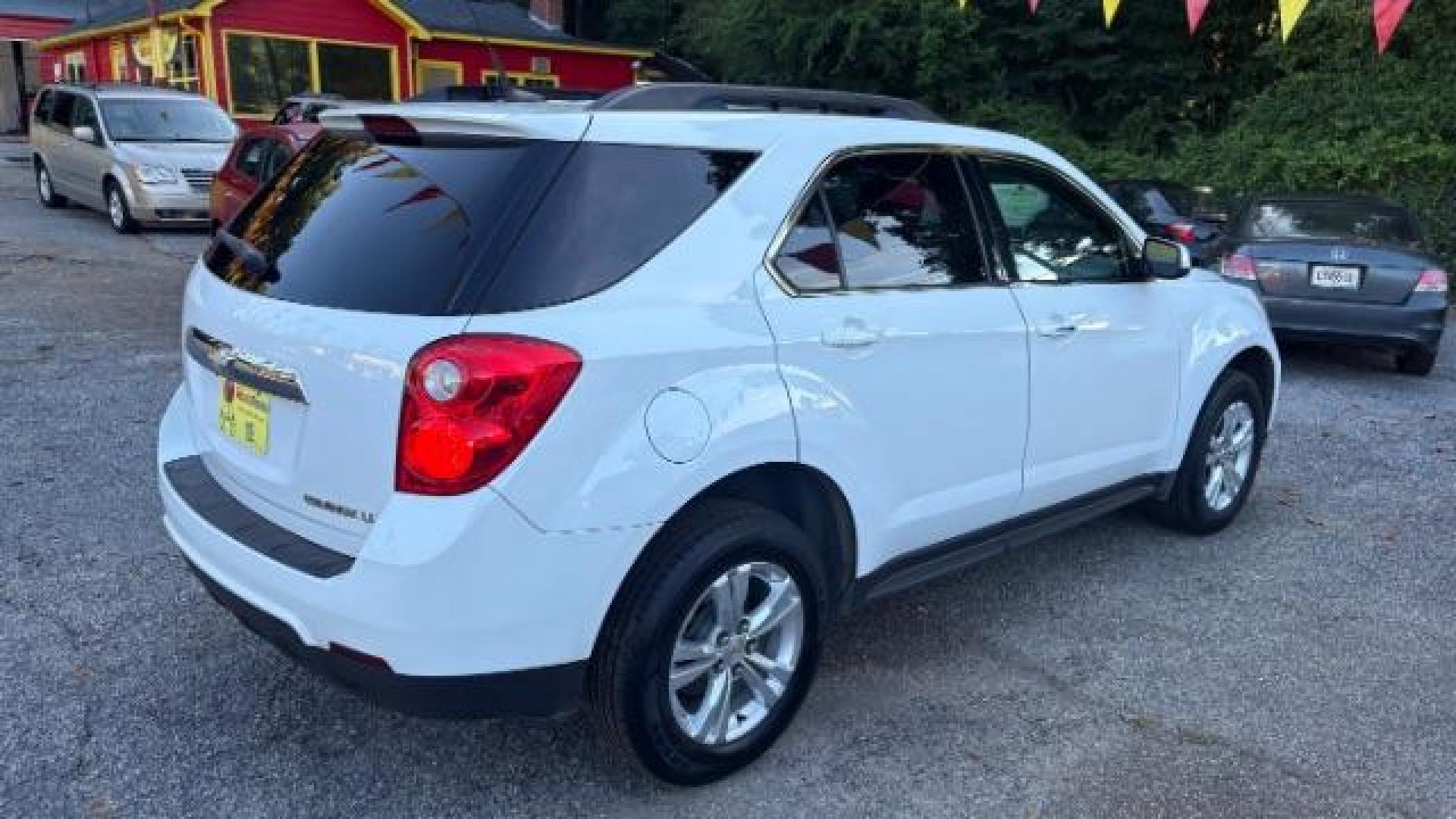 2011 White Chevrolet Equinox 1LT 2WD (2GNALDEC6B1) with an 2.4L L4 DOHC 16V engine, 6-Speed Automatic transmission, located at 1806 Veterans Memorial Hwy SW, Austell, GA, 30168, (770) 944-9558, 33.817959, -84.606987 - Photo#3
