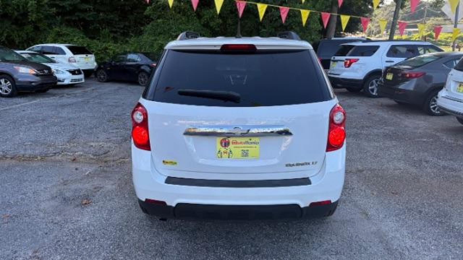 2011 White Chevrolet Equinox 1LT 2WD (2GNALDEC6B1) with an 2.4L L4 DOHC 16V engine, 6-Speed Automatic transmission, located at 1806 Veterans Memorial Hwy SW, Austell, GA, 30168, (770) 944-9558, 33.817959, -84.606987 - Photo#4