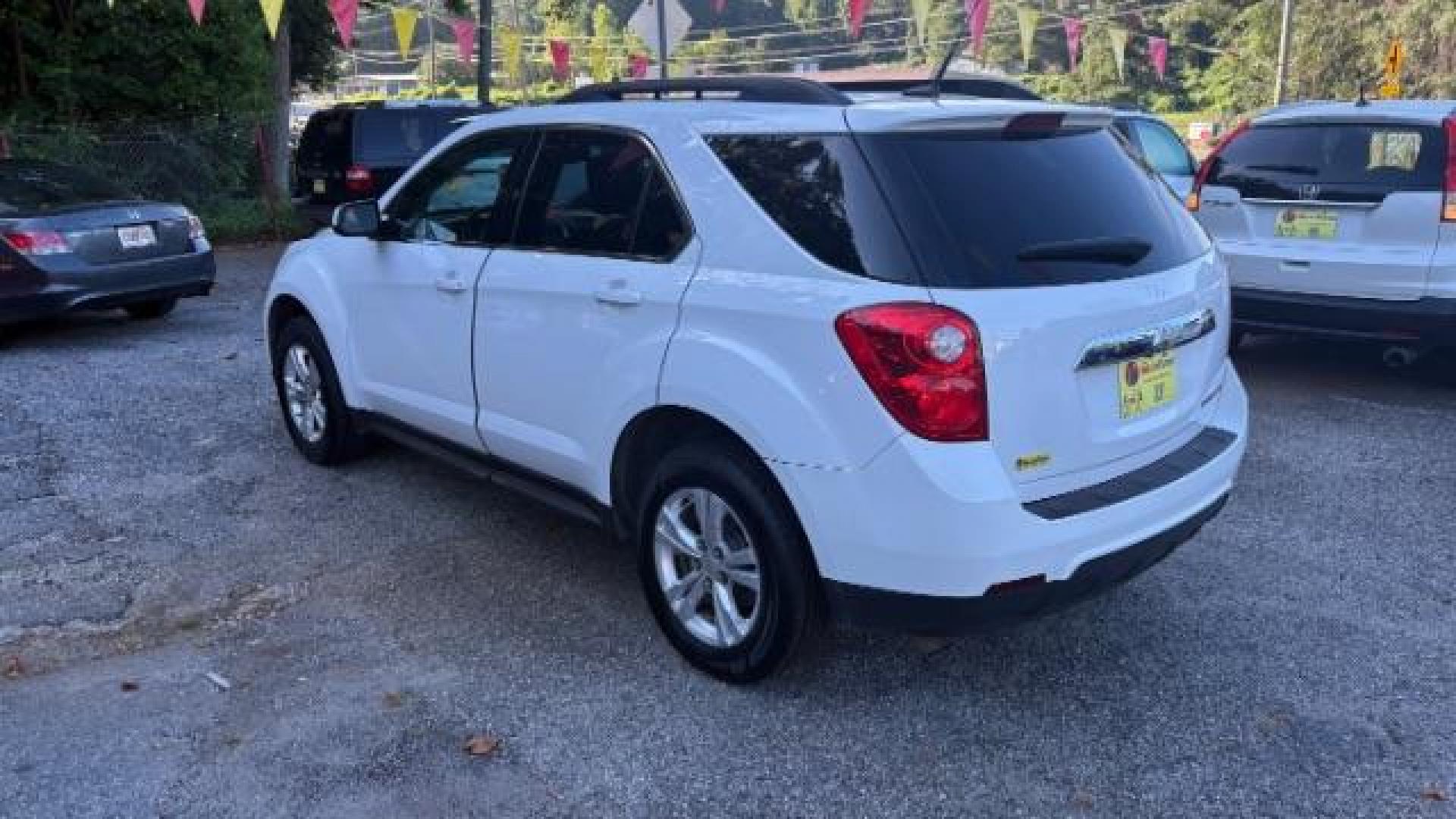 2011 White Chevrolet Equinox 1LT 2WD (2GNALDEC6B1) with an 2.4L L4 DOHC 16V engine, 6-Speed Automatic transmission, located at 1806 Veterans Memorial Hwy SW, Austell, GA, 30168, (770) 944-9558, 33.817959, -84.606987 - Photo#5