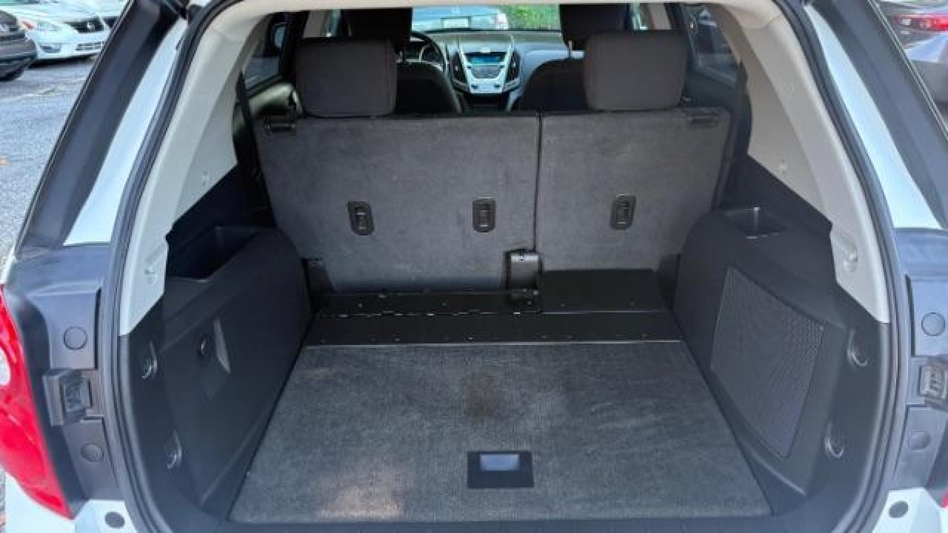 2011 White Chevrolet Equinox 1LT 2WD (2GNALDEC6B1) with an 2.4L L4 DOHC 16V engine, 6-Speed Automatic transmission, located at 1806 Veterans Memorial Hwy SW, Austell, GA, 30168, (770) 944-9558, 33.817959, -84.606987 - Photo#7