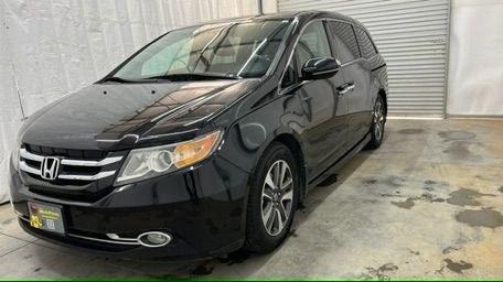 2015 Black Honda Odyssey Touring (5FNRL5H91FB) with an 3.5L V6 SOHC 24V engine, 6-Speed Automatic transmission, located at 1806 Veterans Memorial Hwy SW, Austell, GA, 30168, (770) 944-9558, 33.817959, -84.606987 - Photo#1