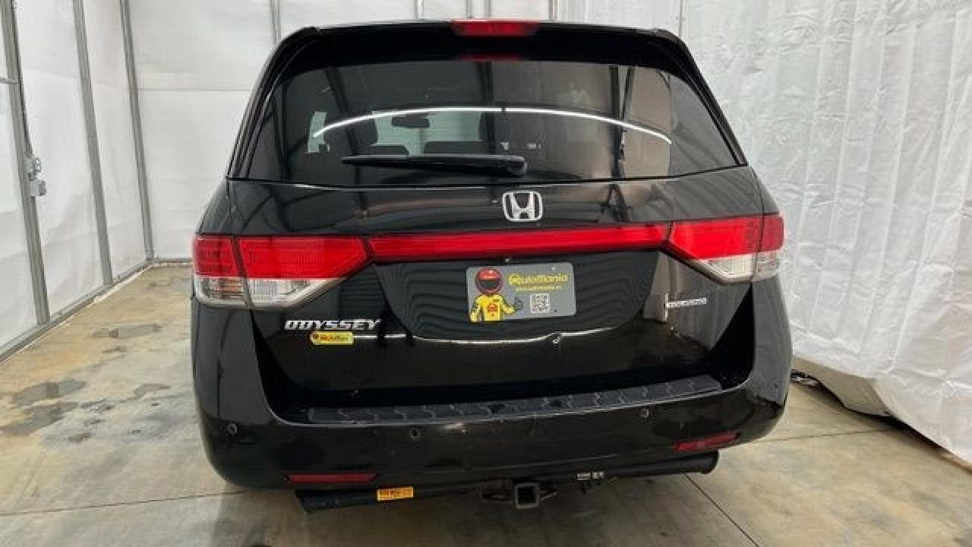 2015 Black Honda Odyssey Touring (5FNRL5H91FB) with an 3.5L V6 SOHC 24V engine, 6-Speed Automatic transmission, located at 1806 Veterans Memorial Hwy SW, Austell, GA, 30168, (770) 944-9558, 33.817959, -84.606987- Photo#3