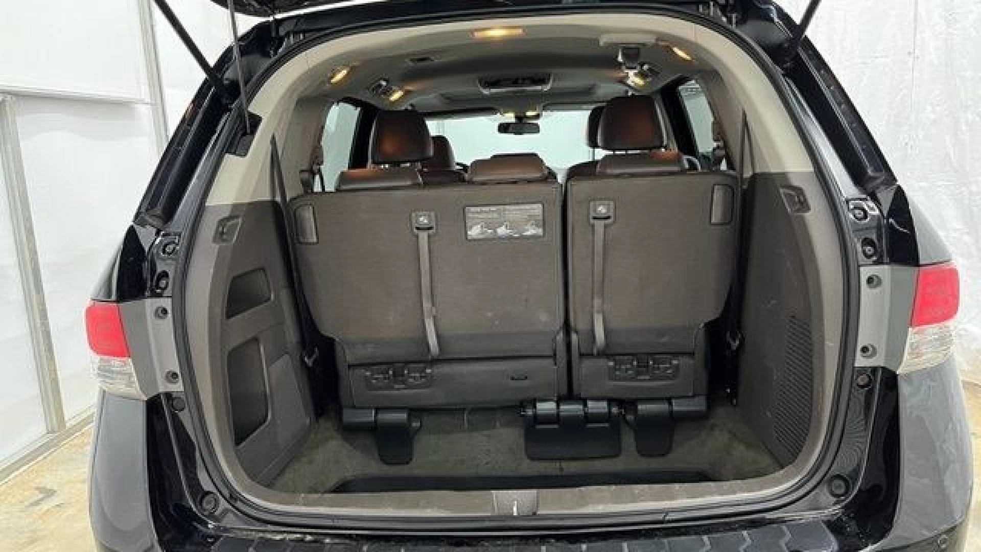 2015 Black Honda Odyssey Touring (5FNRL5H91FB) with an 3.5L V6 SOHC 24V engine, 6-Speed Automatic transmission, located at 1806 Veterans Memorial Hwy SW, Austell, GA, 30168, (770) 944-9558, 33.817959, -84.606987- Photo#10