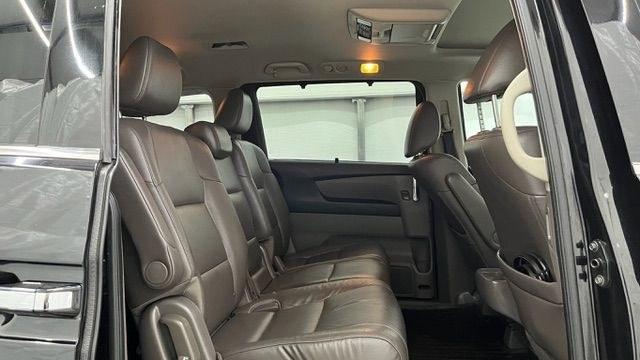 2015 Black Honda Odyssey Touring (5FNRL5H91FB) with an 3.5L V6 SOHC 24V engine, 6-Speed Automatic transmission, located at 1806 Veterans Memorial Hwy SW, Austell, GA, 30168, (770) 944-9558, 33.817959, -84.606987 - Photo#12