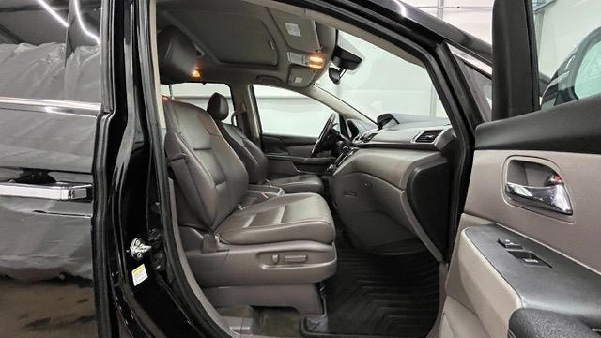 2015 Black Honda Odyssey Touring (5FNRL5H91FB) with an 3.5L V6 SOHC 24V engine, 6-Speed Automatic transmission, located at 1806 Veterans Memorial Hwy SW, Austell, GA, 30168, (770) 944-9558, 33.817959, -84.606987- Photo#13