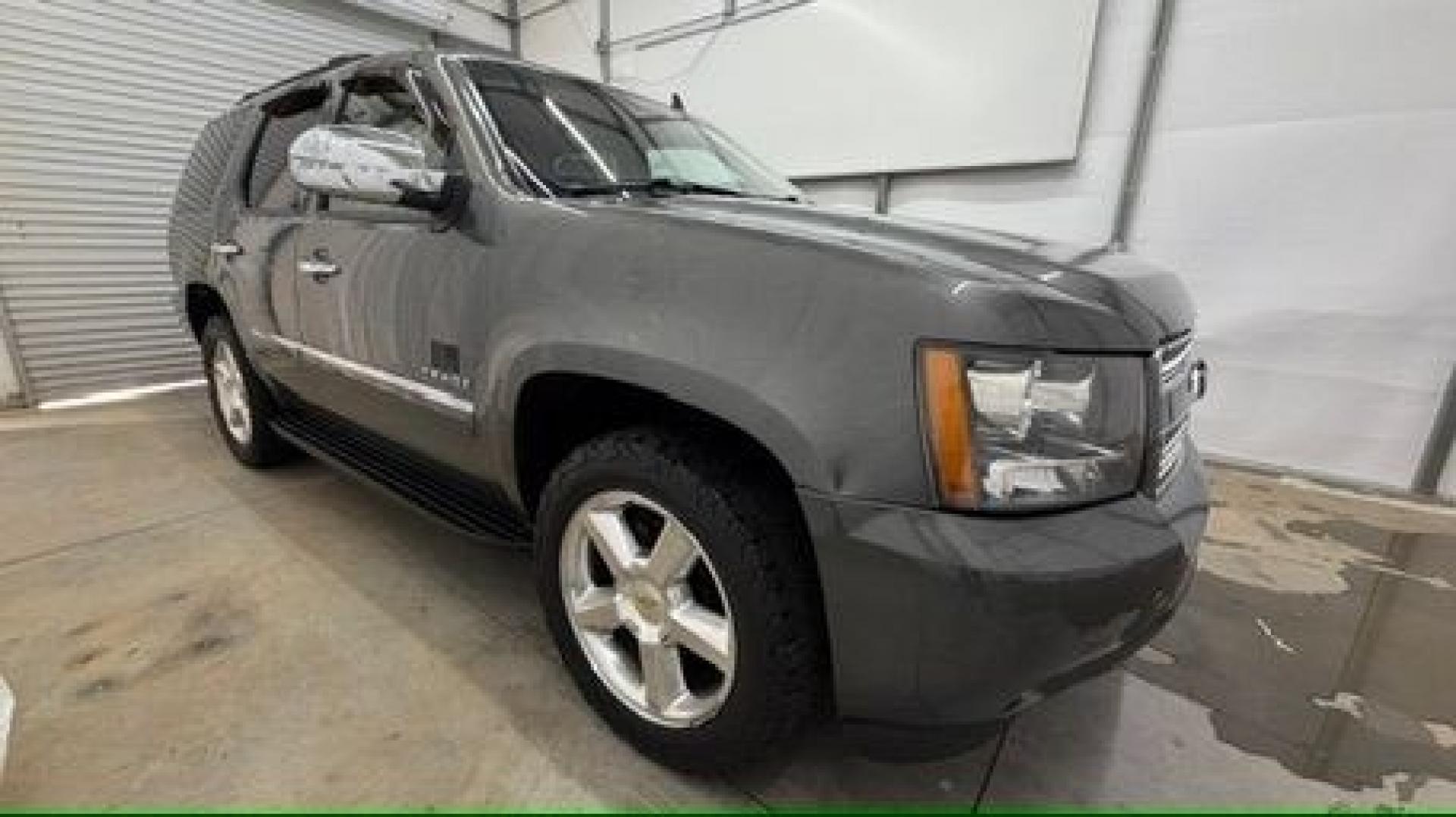 2011 Green Chevrolet Tahoe LTZ 2WD (1GNSCCE05BR) with an 5.3L V8 OHV 16V FFV engine, 6-Speed Automatic transmission, located at 1806 Veterans Memorial Hwy SW, Austell, GA, 30168, (770) 944-9558, 33.817959, -84.606987 - Photo#3