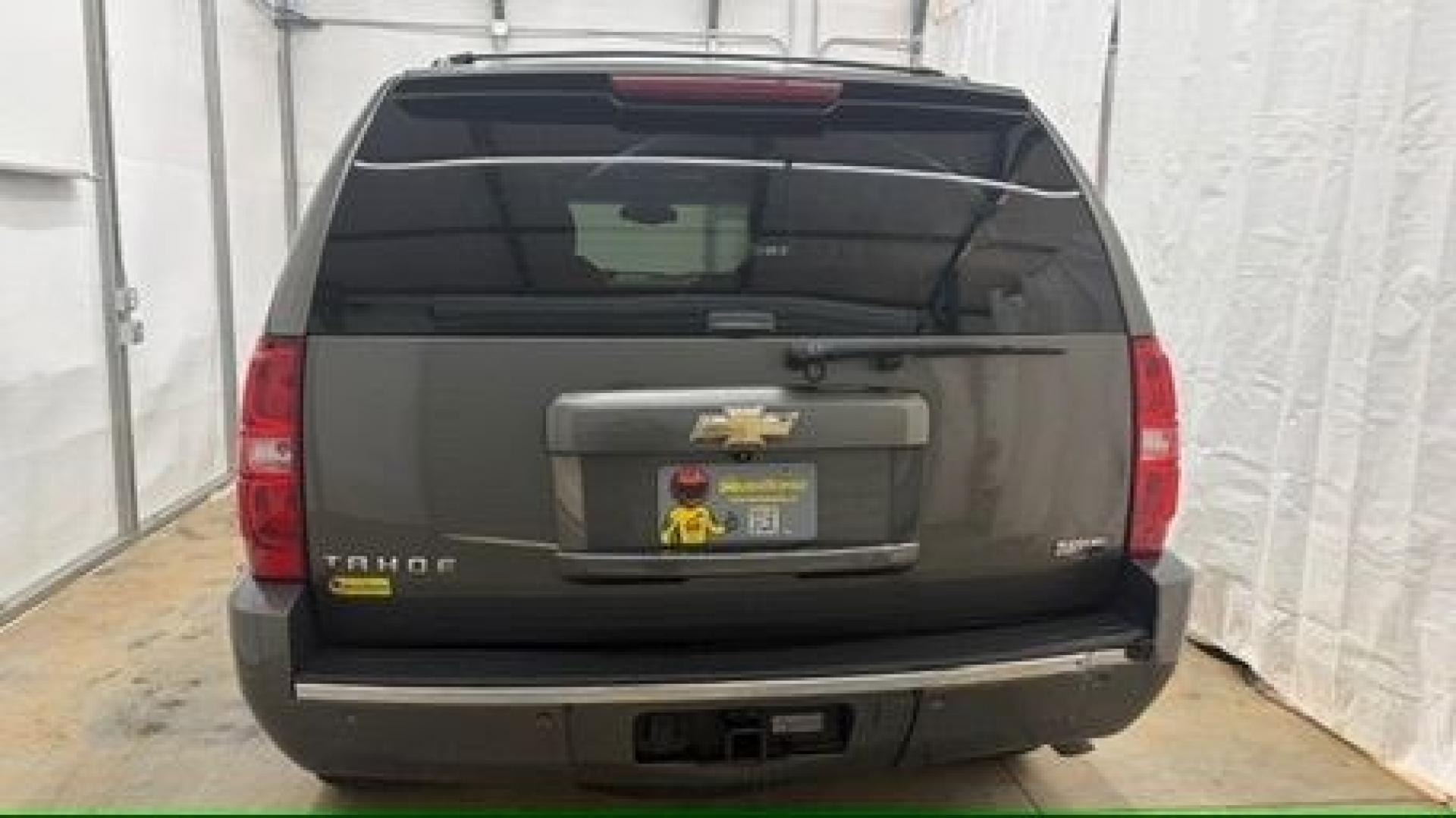 2011 Green Chevrolet Tahoe LTZ 2WD (1GNSCCE05BR) with an 5.3L V8 OHV 16V FFV engine, 6-Speed Automatic transmission, located at 1806 Veterans Memorial Hwy SW, Austell, GA, 30168, (770) 944-9558, 33.817959, -84.606987 - Photo#6