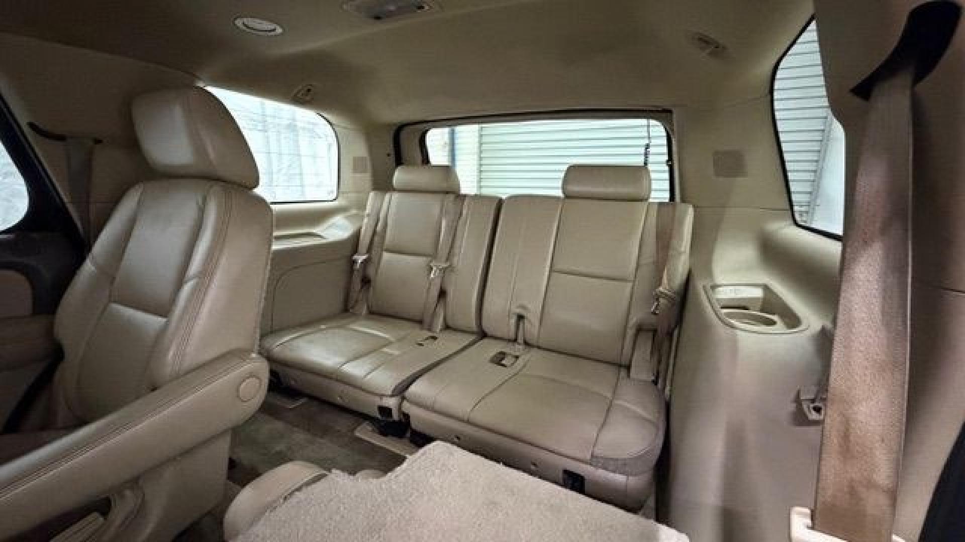 2011 Green Chevrolet Tahoe LTZ 2WD (1GNSCCE05BR) with an 5.3L V8 OHV 16V FFV engine, 6-Speed Automatic transmission, located at 1806 Veterans Memorial Hwy SW, Austell, GA, 30168, (770) 944-9558, 33.817959, -84.606987 - Photo#15