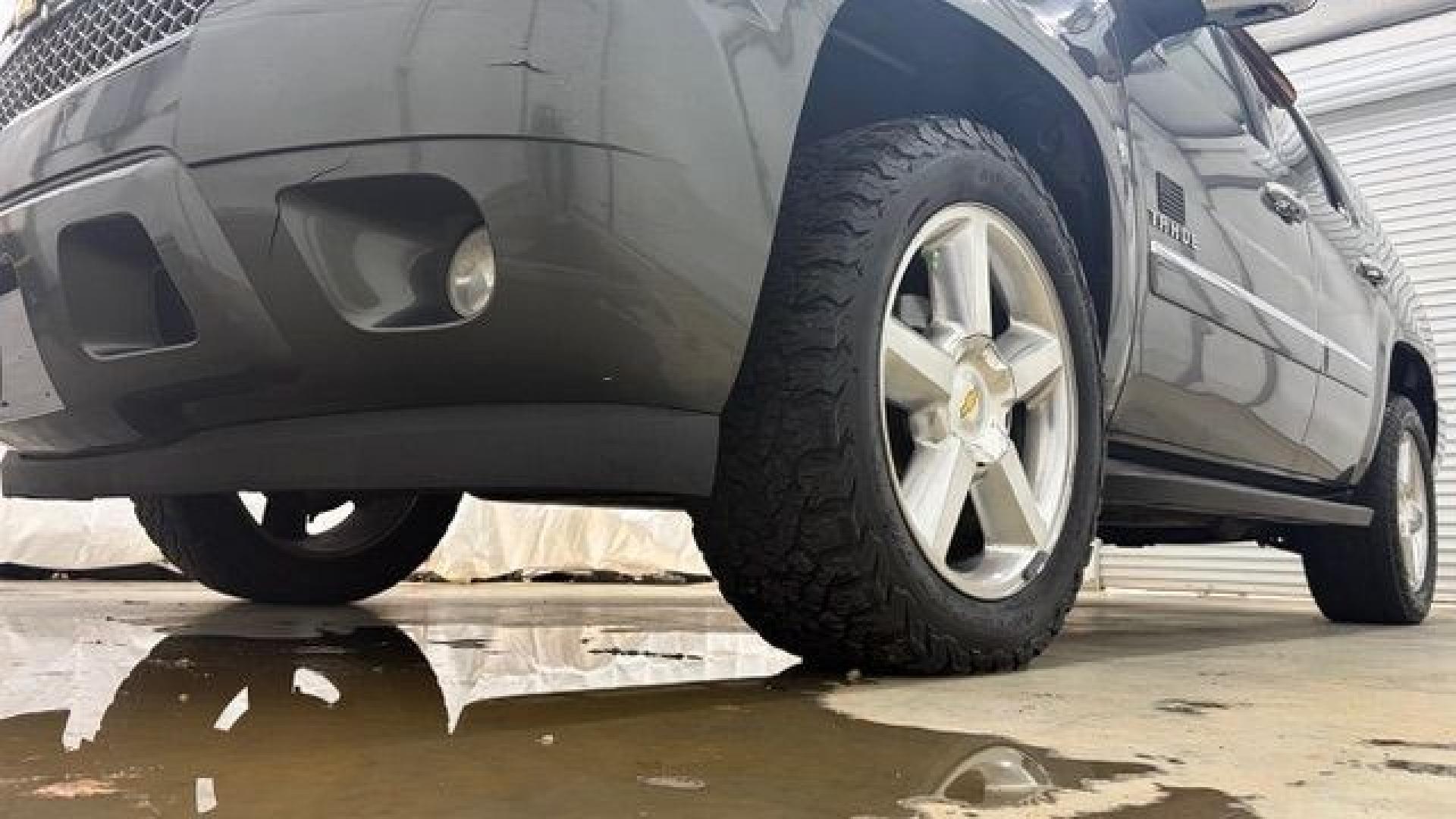 2011 Green Chevrolet Tahoe LTZ 2WD (1GNSCCE05BR) with an 5.3L V8 OHV 16V FFV engine, 6-Speed Automatic transmission, located at 1806 Veterans Memorial Hwy SW, Austell, GA, 30168, (770) 944-9558, 33.817959, -84.606987 - Photo#21
