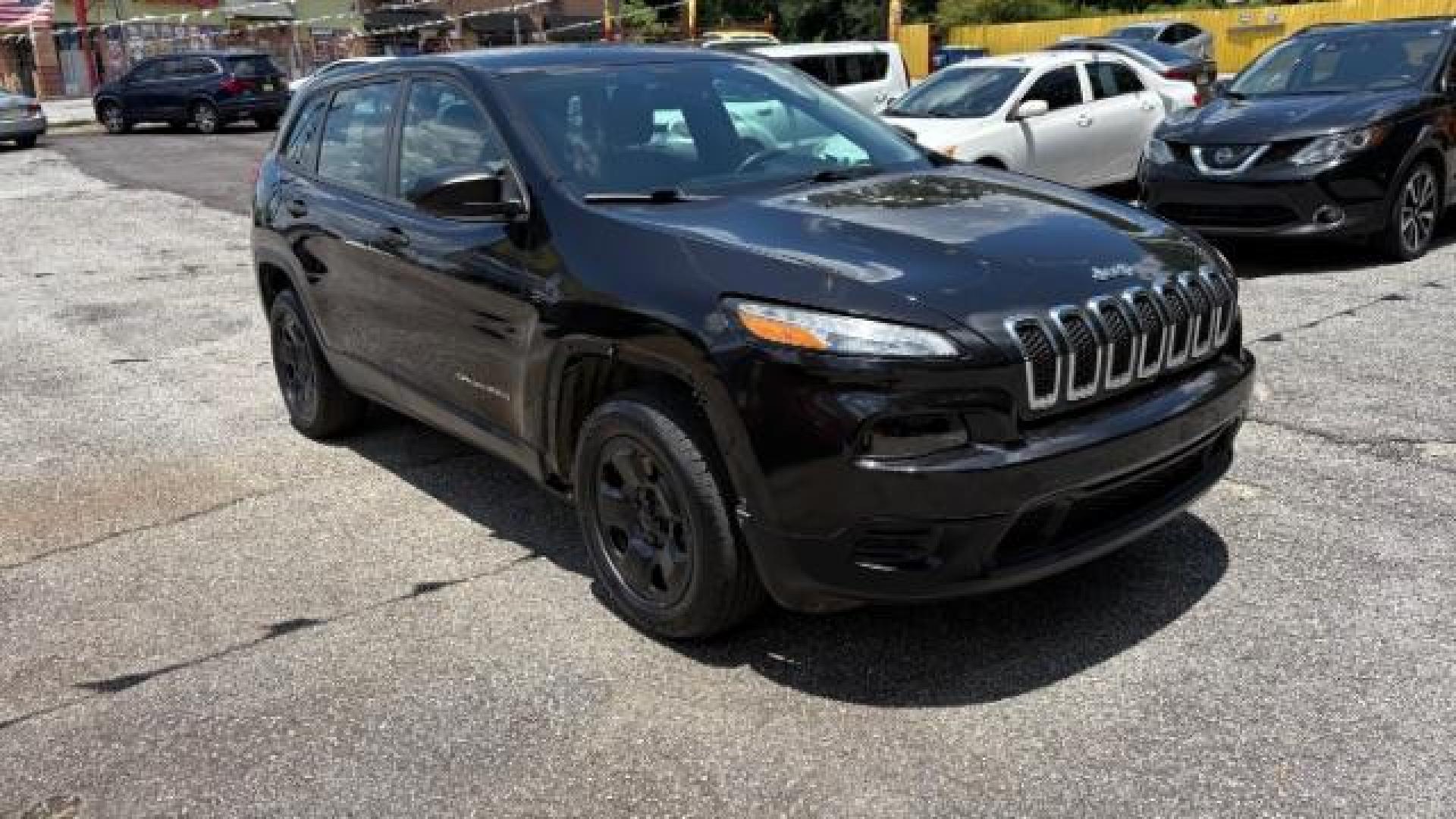 2014 Black Jeep Cherokee Sport FWD (1C4PJLAB7EW) with an 2.4L L4 DOHC 16V engine, 9-Speed Automatic transmission, located at 1806 Veterans Memorial Hwy SW, Austell, GA, 30168, (770) 944-9558, 33.817959, -84.606987 - Photo#2