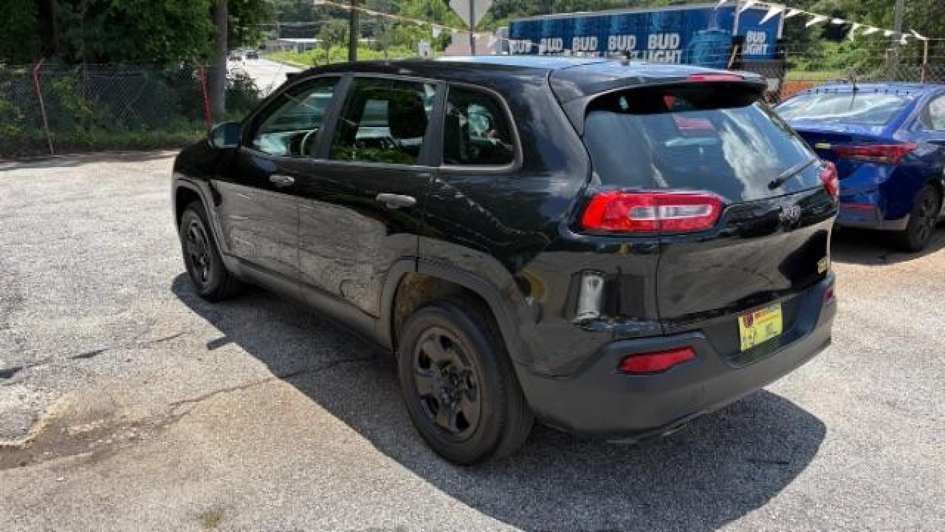 2014 Black Jeep Cherokee Sport FWD (1C4PJLAB7EW) with an 2.4L L4 DOHC 16V engine, 9-Speed Automatic transmission, located at 1806 Veterans Memorial Hwy SW, Austell, GA, 30168, (770) 944-9558, 33.817959, -84.606987 - Photo#5