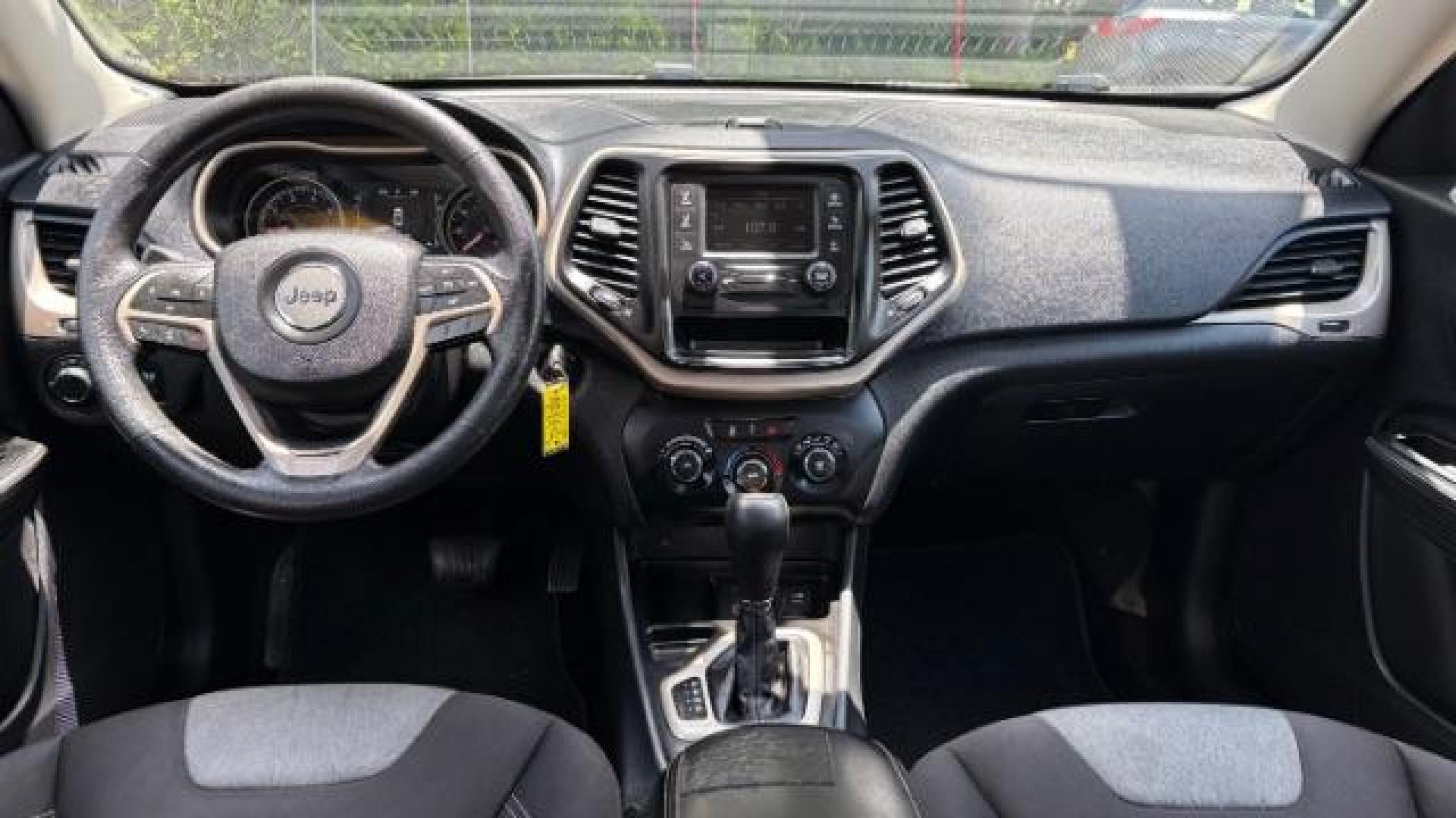 2014 Black Jeep Cherokee Sport FWD (1C4PJLAB7EW) with an 2.4L L4 DOHC 16V engine, 9-Speed Automatic transmission, located at 1806 Veterans Memorial Hwy SW, Austell, GA, 30168, (770) 944-9558, 33.817959, -84.606987 - Photo#6