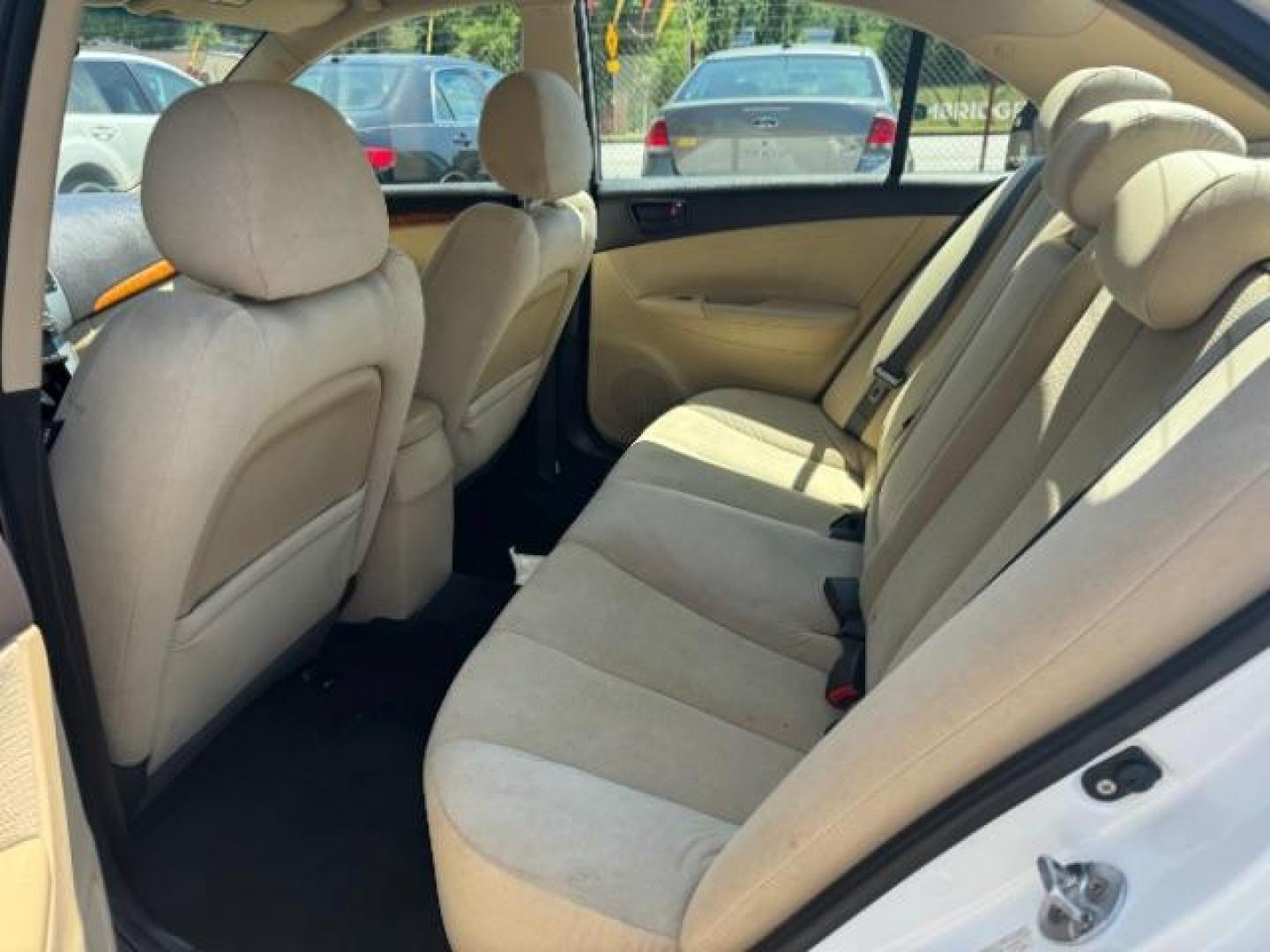 2009 White Hyundai Sonata GLS V6 (5NPET46F69H) with an 3.3L V6 DOHC 24V engine, 5-Speed Automatic transmission, located at 1806 Veterans Memorial Hwy SW, Austell, GA, 30168, (770) 944-9558, 33.817959, -84.606987 - Photo#9