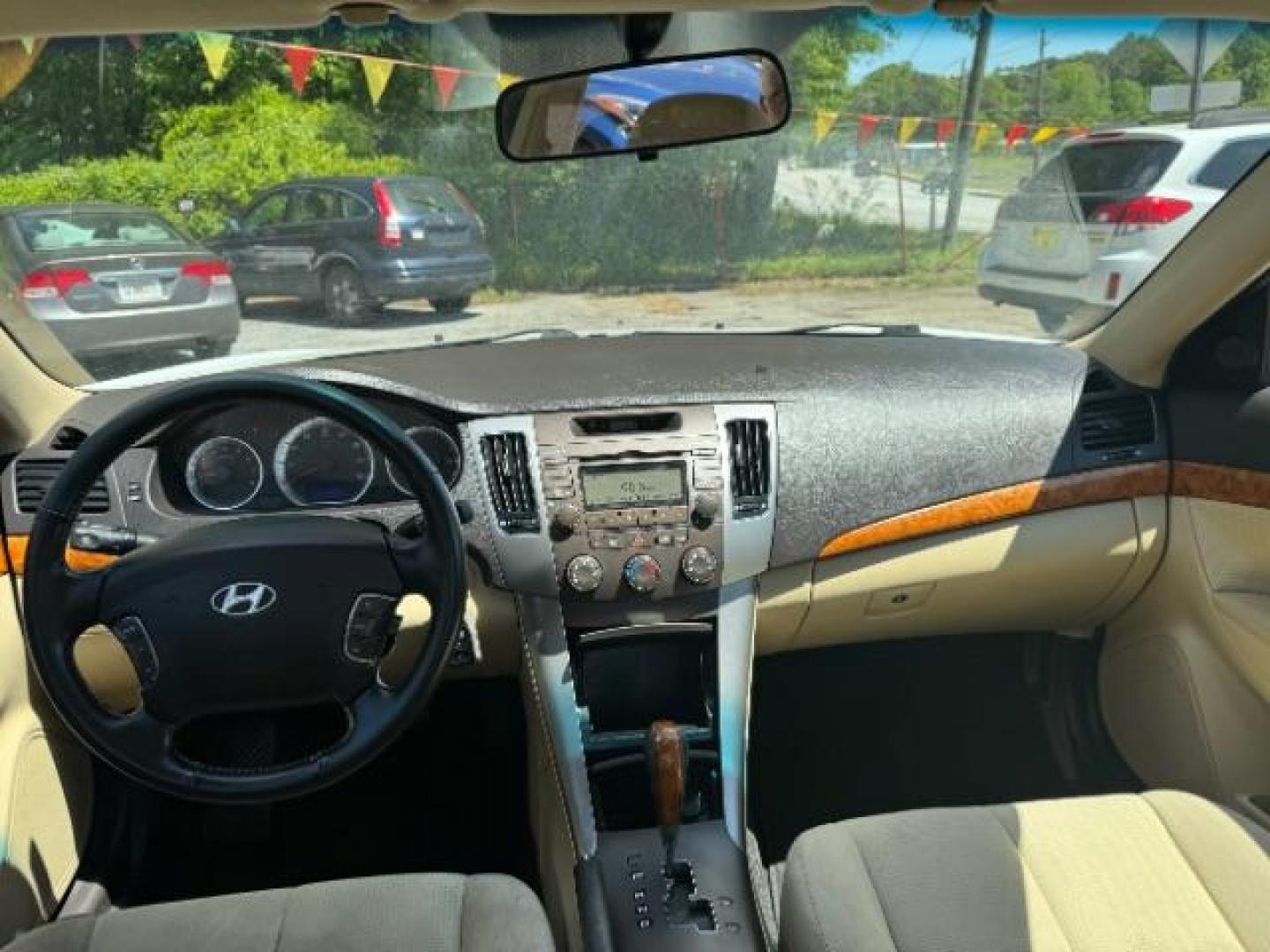 2009 White Hyundai Sonata GLS V6 (5NPET46F69H) with an 3.3L V6 DOHC 24V engine, 5-Speed Automatic transmission, located at 1806 Veterans Memorial Hwy SW, Austell, GA, 30168, (770) 944-9558, 33.817959, -84.606987 - Photo#11