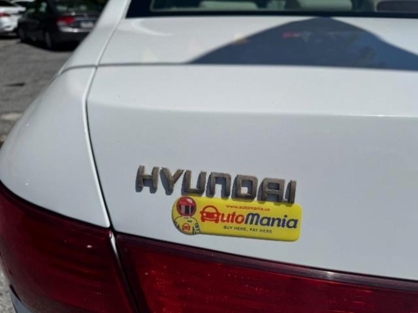 2009 White Hyundai Sonata GLS V6 (5NPET46F69H) with an 3.3L V6 DOHC 24V engine, 5-Speed Automatic transmission, located at 1806 Veterans Memorial Hwy SW, Austell, GA, 30168, (770) 944-9558, 33.817959, -84.606987 - Photo#14