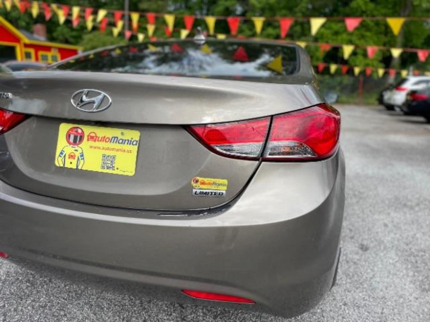 2013 Brown Hyundai Elantra Limited (5NPDH4AE1DH) with an 1.8L L4 DOHC 16V engine, 6-Speed Automatic transmission, located at 1806 Veterans Memorial Hwy SW, Austell, GA, 30168, (770) 944-9558, 33.817959, -84.606987 - Photo#17