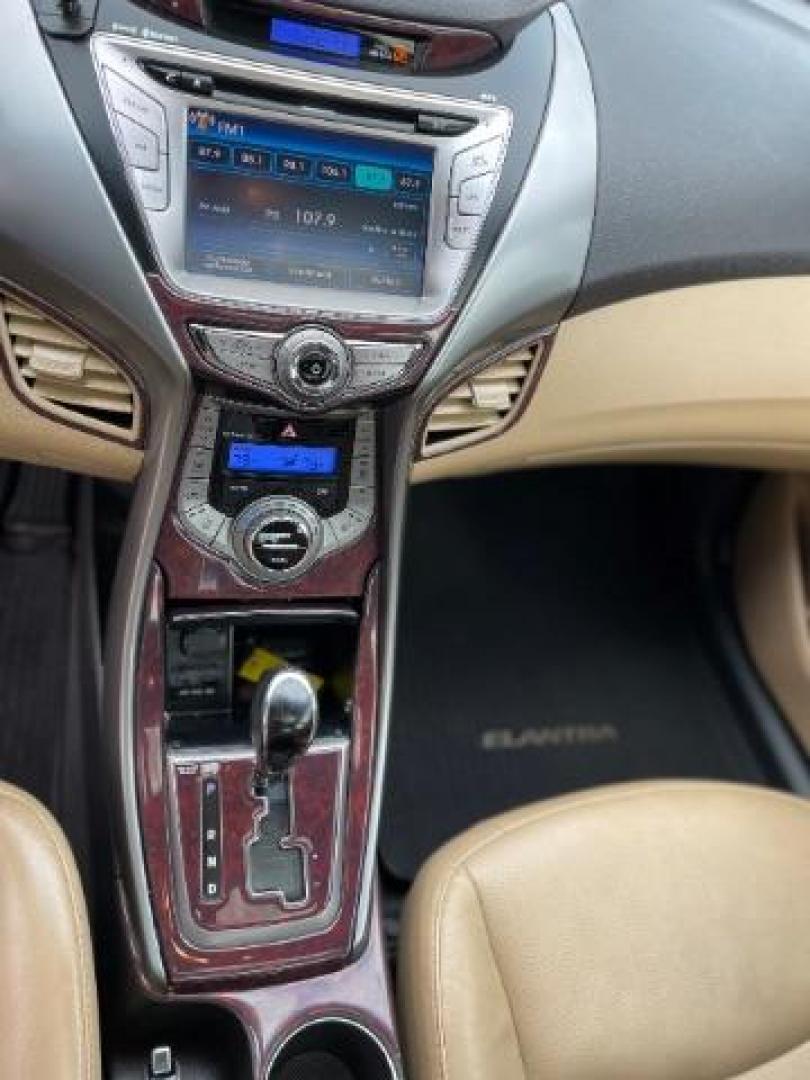 2013 Brown Hyundai Elantra Limited (5NPDH4AE1DH) with an 1.8L L4 DOHC 16V engine, 6-Speed Automatic transmission, located at 1806 Veterans Memorial Hwy SW, Austell, GA, 30168, (770) 944-9558, 33.817959, -84.606987 - Photo#6