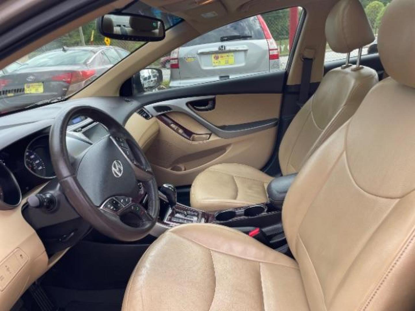 2013 Brown Hyundai Elantra Limited (5NPDH4AE1DH) with an 1.8L L4 DOHC 16V engine, 6-Speed Automatic transmission, located at 1806 Veterans Memorial Hwy SW, Austell, GA, 30168, (770) 944-9558, 33.817959, -84.606987 - Photo#8